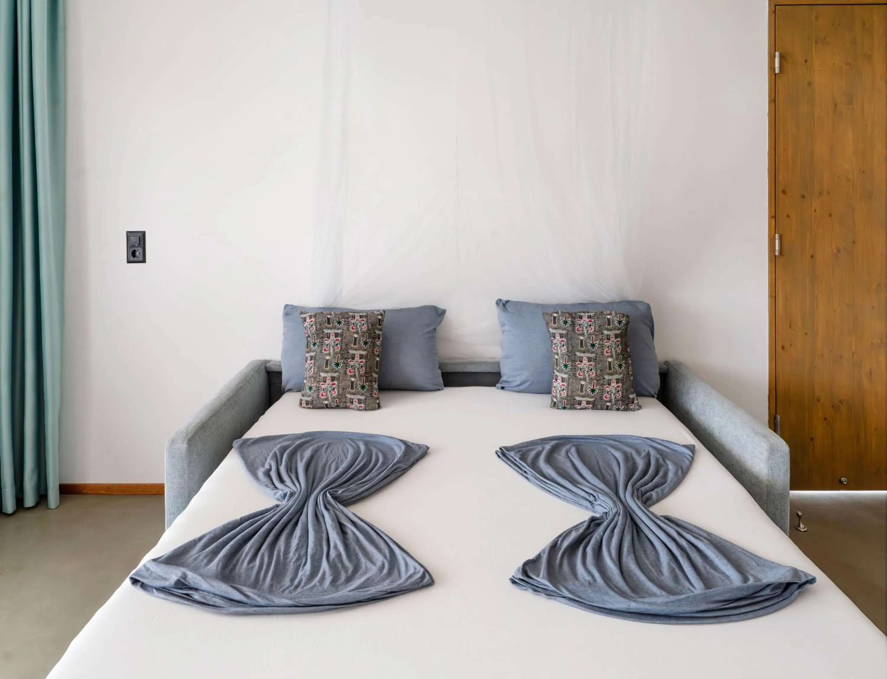 Bed in King Fisher Village Eco-Boutique Hotel