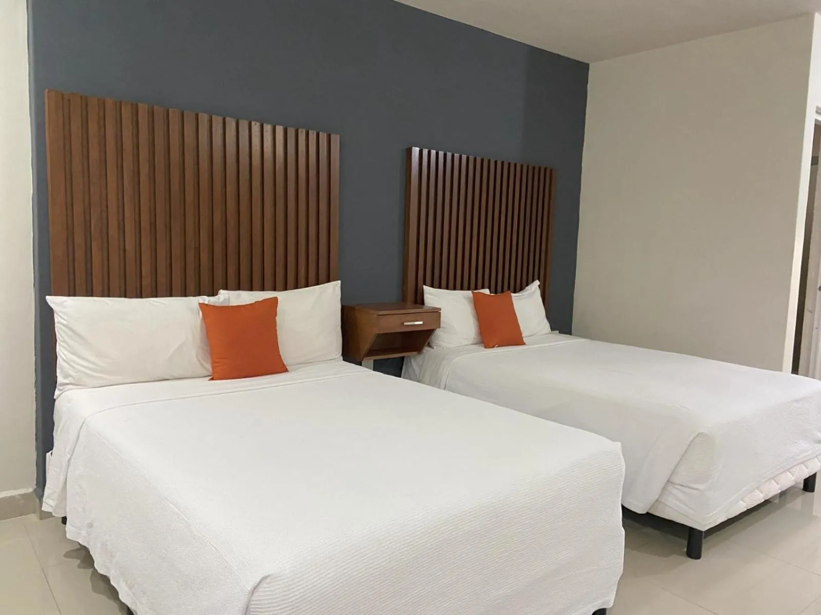 Bed in Hotel NUVE EXPRESS