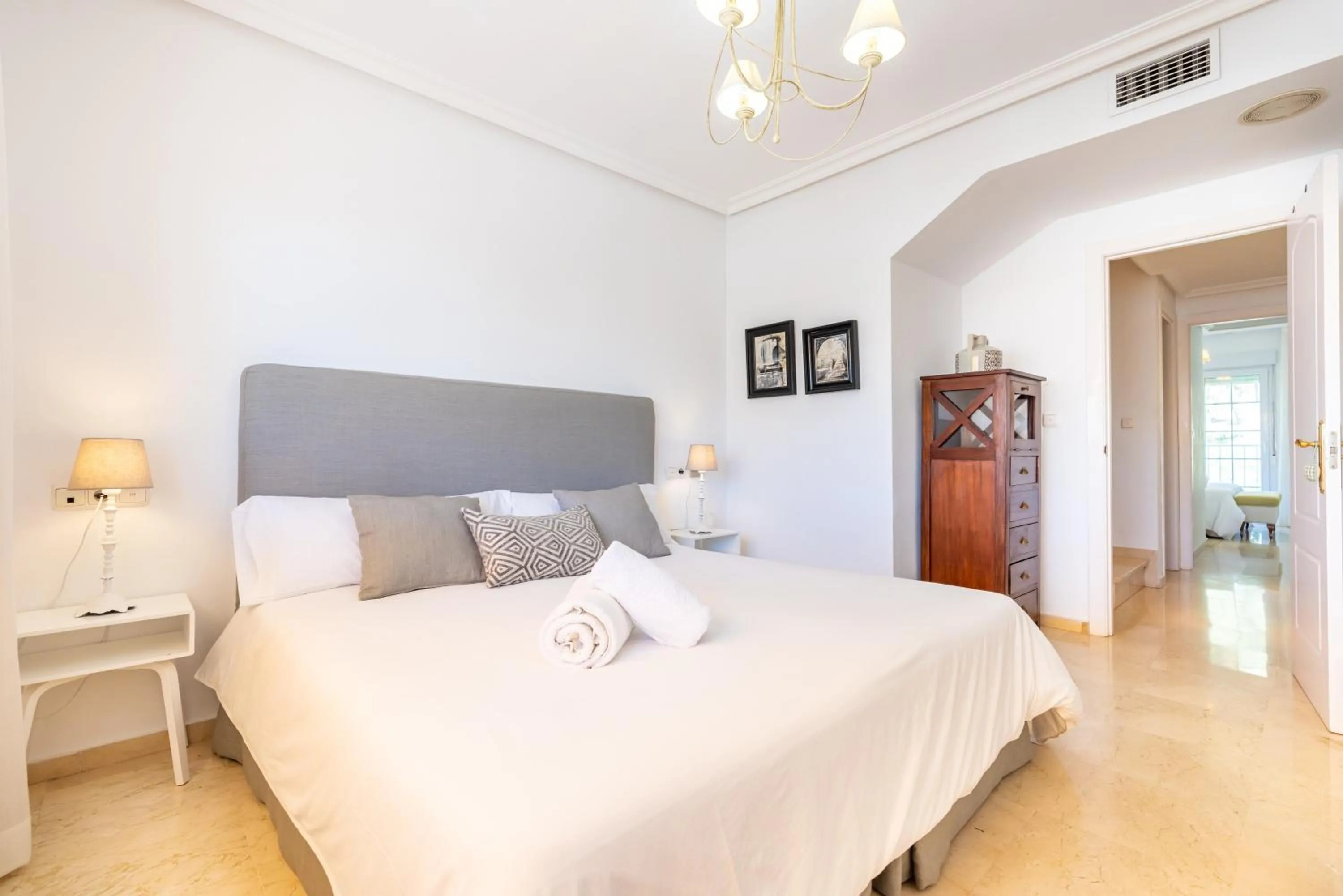 Living room, Bed in Spectacular Penthouse Puente Romano