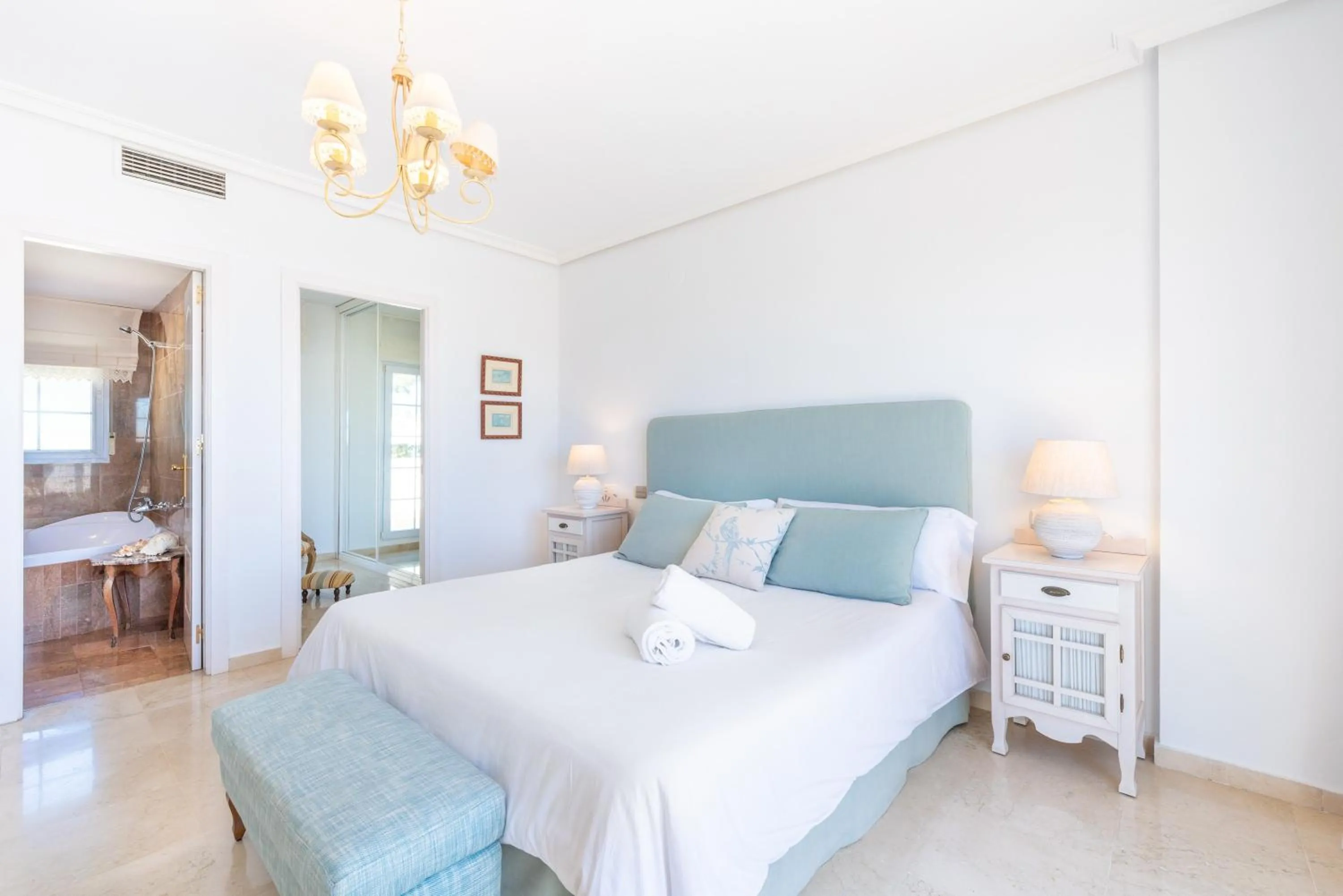 Living room, Bed in Spectacular Penthouse Puente Romano