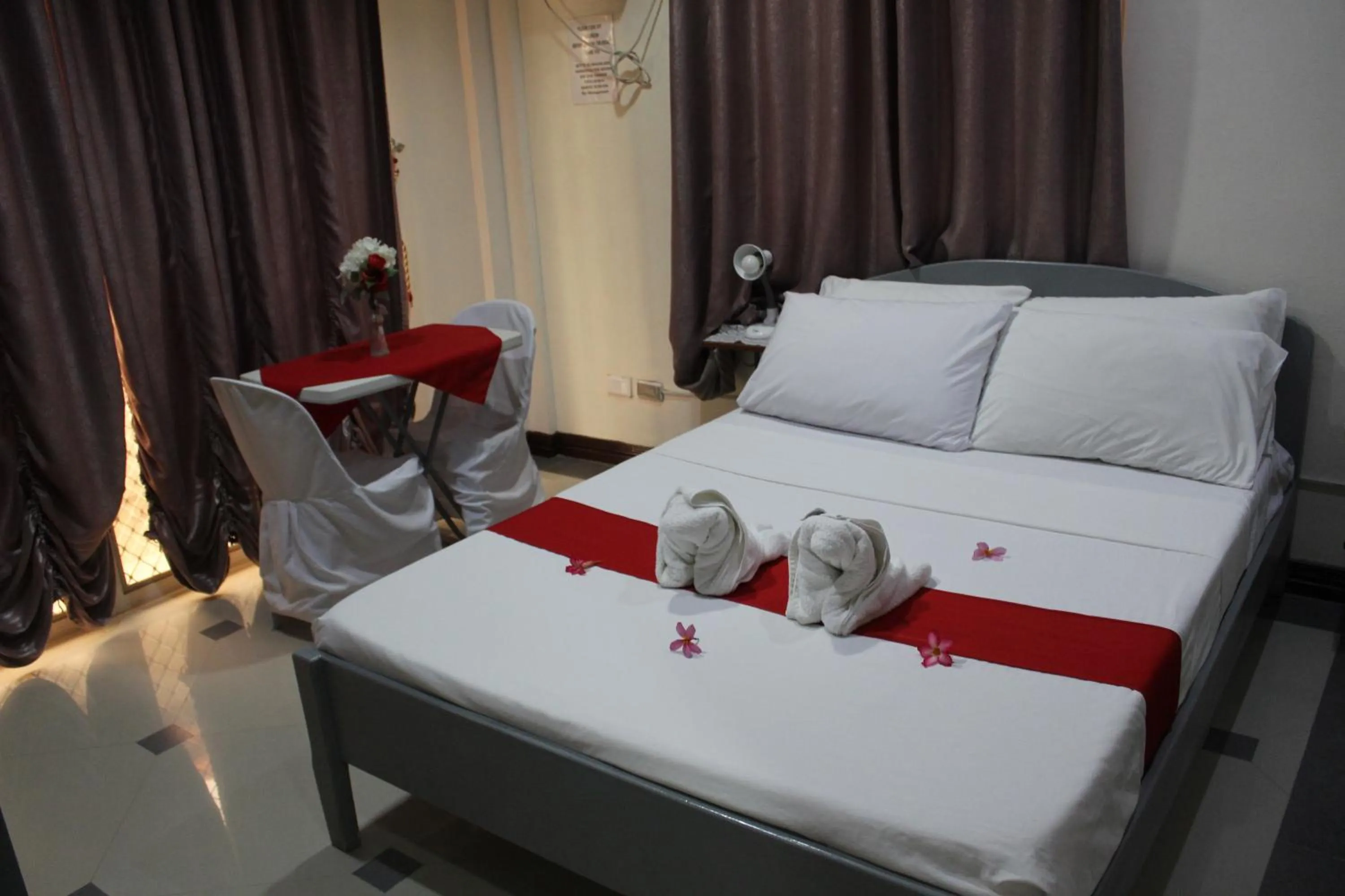 Bed in LORELEI BEACH RESORT