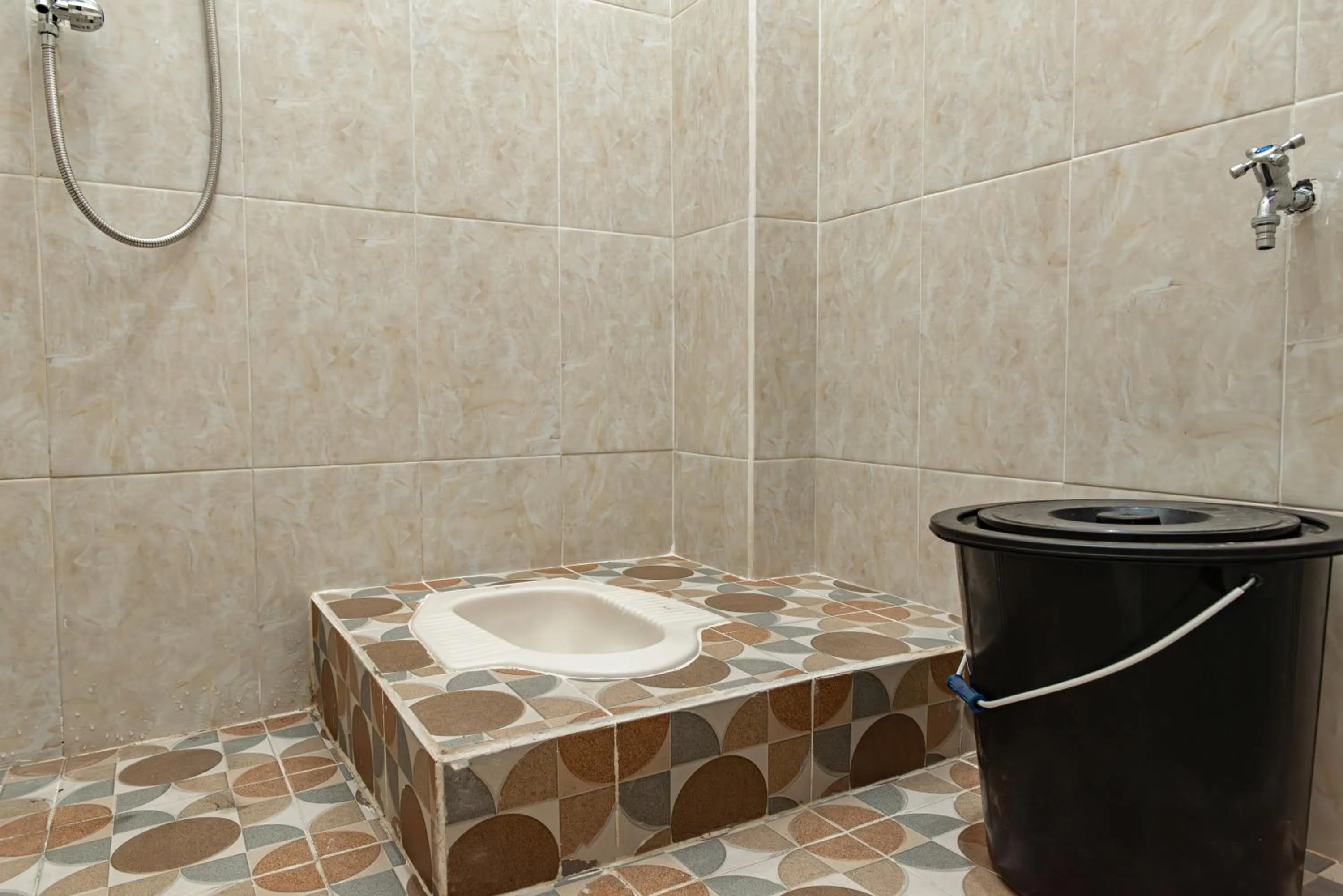 Bathroom in Hotel O Alnasya Syariah