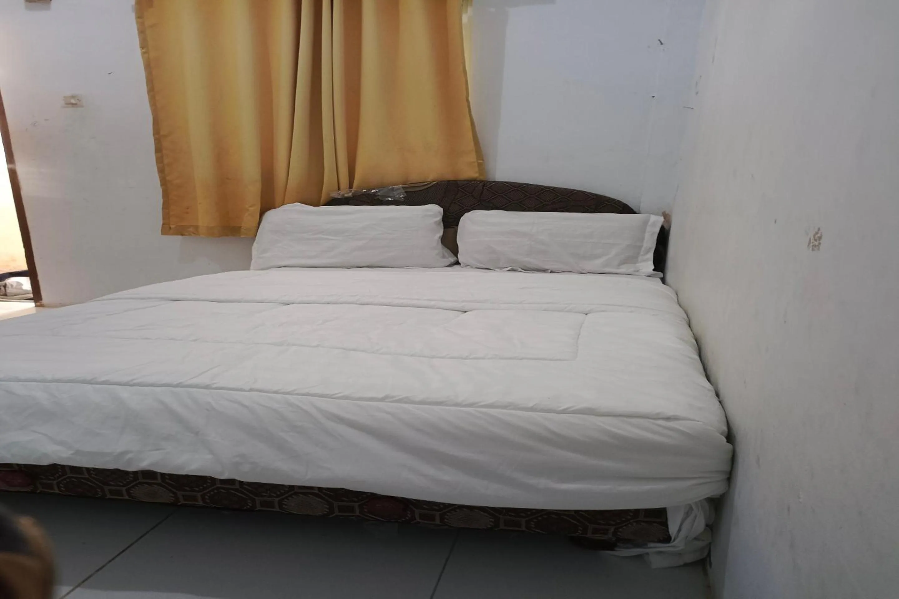 Bedroom, Bed in Hotel O Elang Homestay