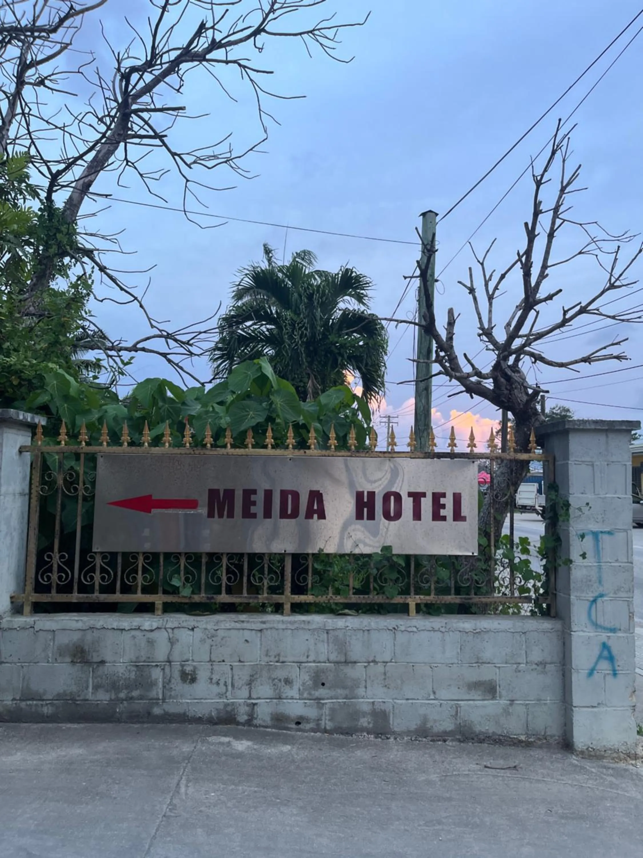 Property logo or sign in Meida Hotel