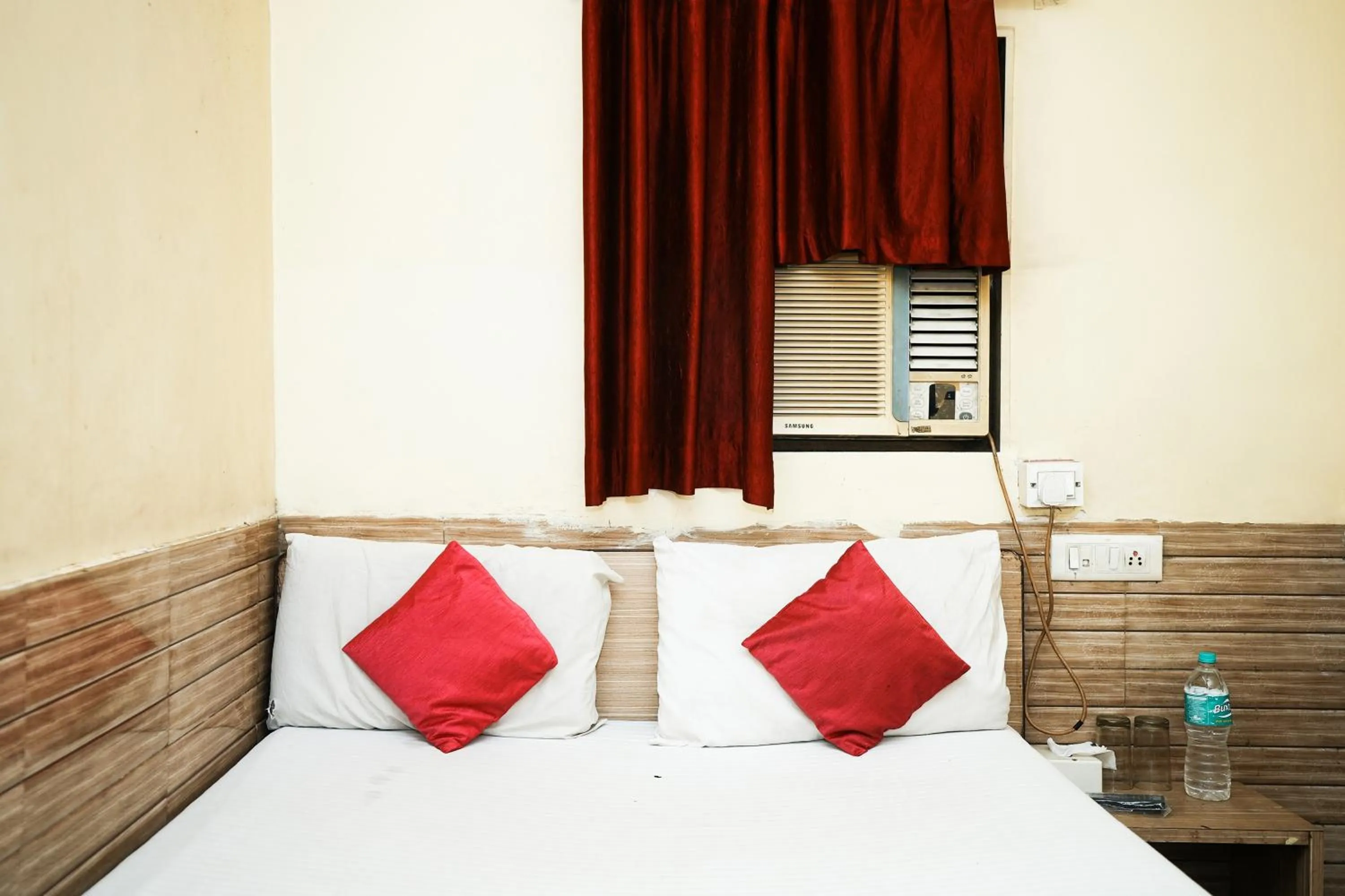 Bed in Hotel Sai Parikrama