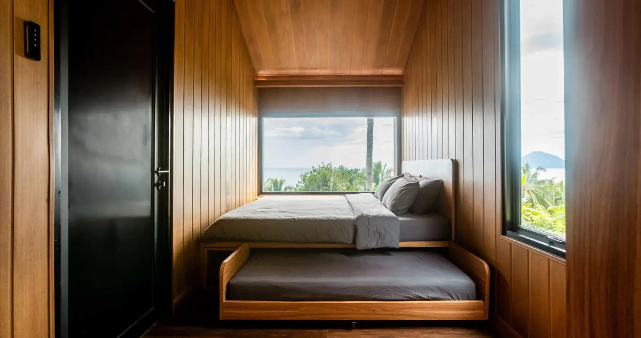 Bed in Bobocabin Bunaken Hills, Manado Bed in Bobocabin Bunaken Hills, Manado