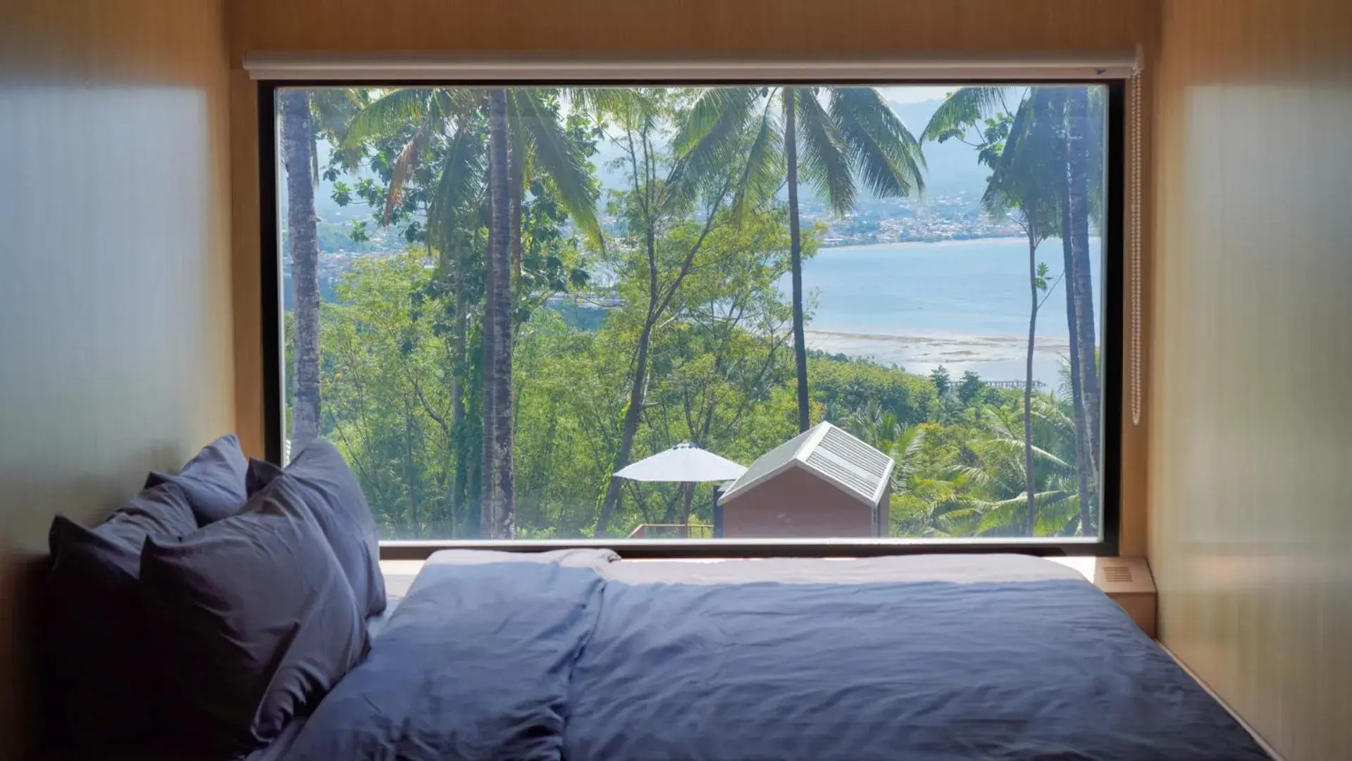 Bed in Bobocabin Bunaken Hills, Manado Bed in Bobocabin Bunaken Hills, Manado