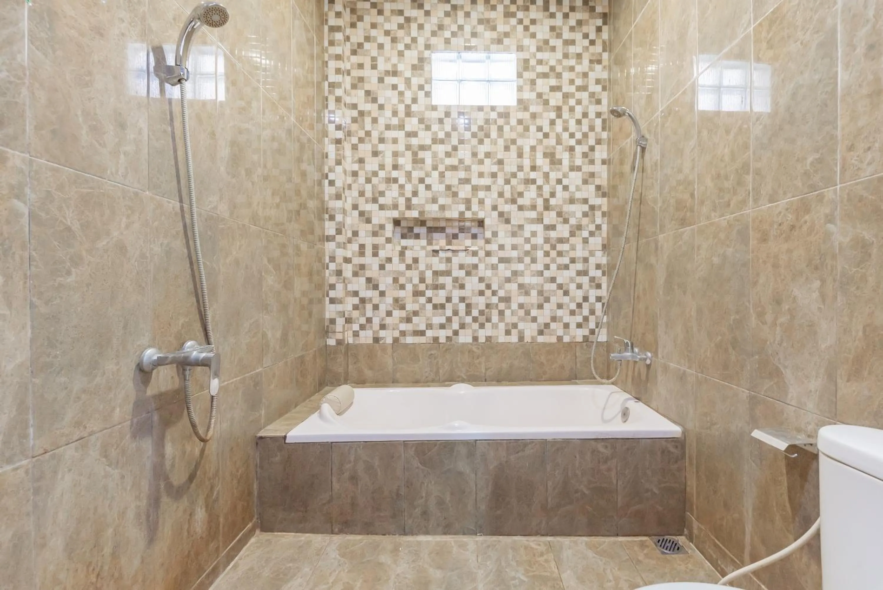 Bathroom in Urbanview Resort Botol Cisarua Puncak Bogor