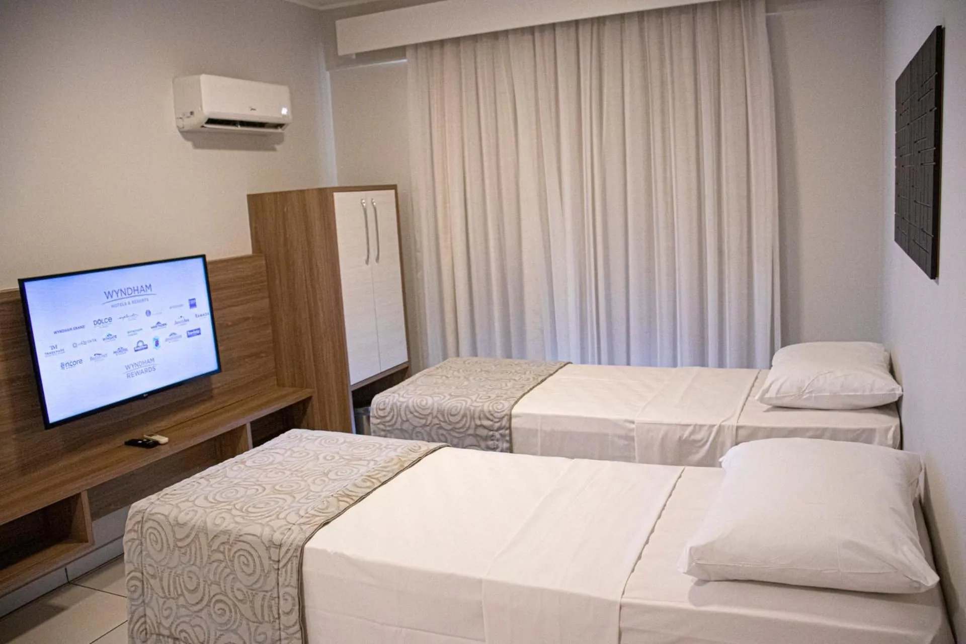 Bed in Wyndham Olímpia Royal Hotels