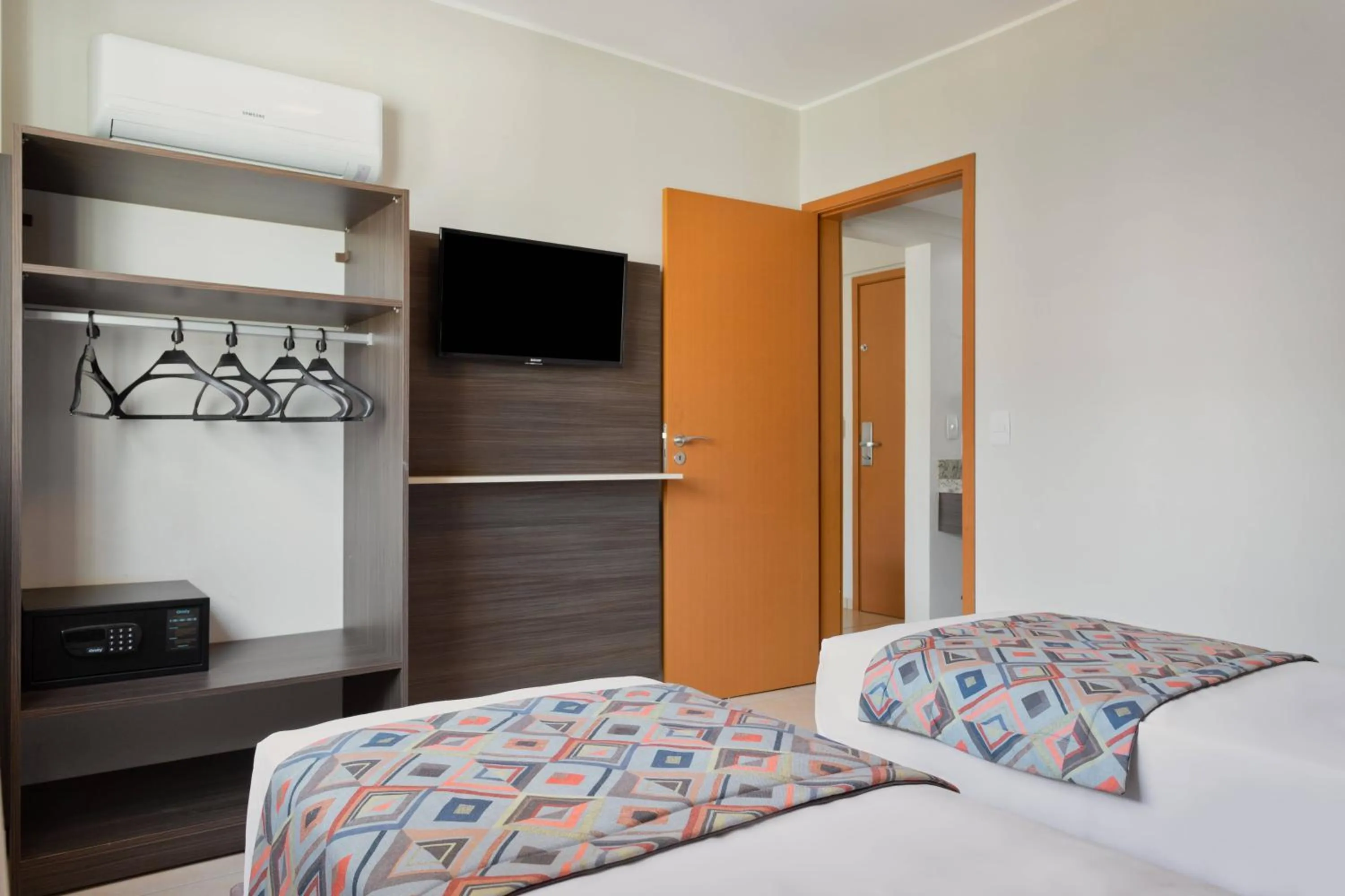 Bed in Wyndham Olímpia Royal Hotels