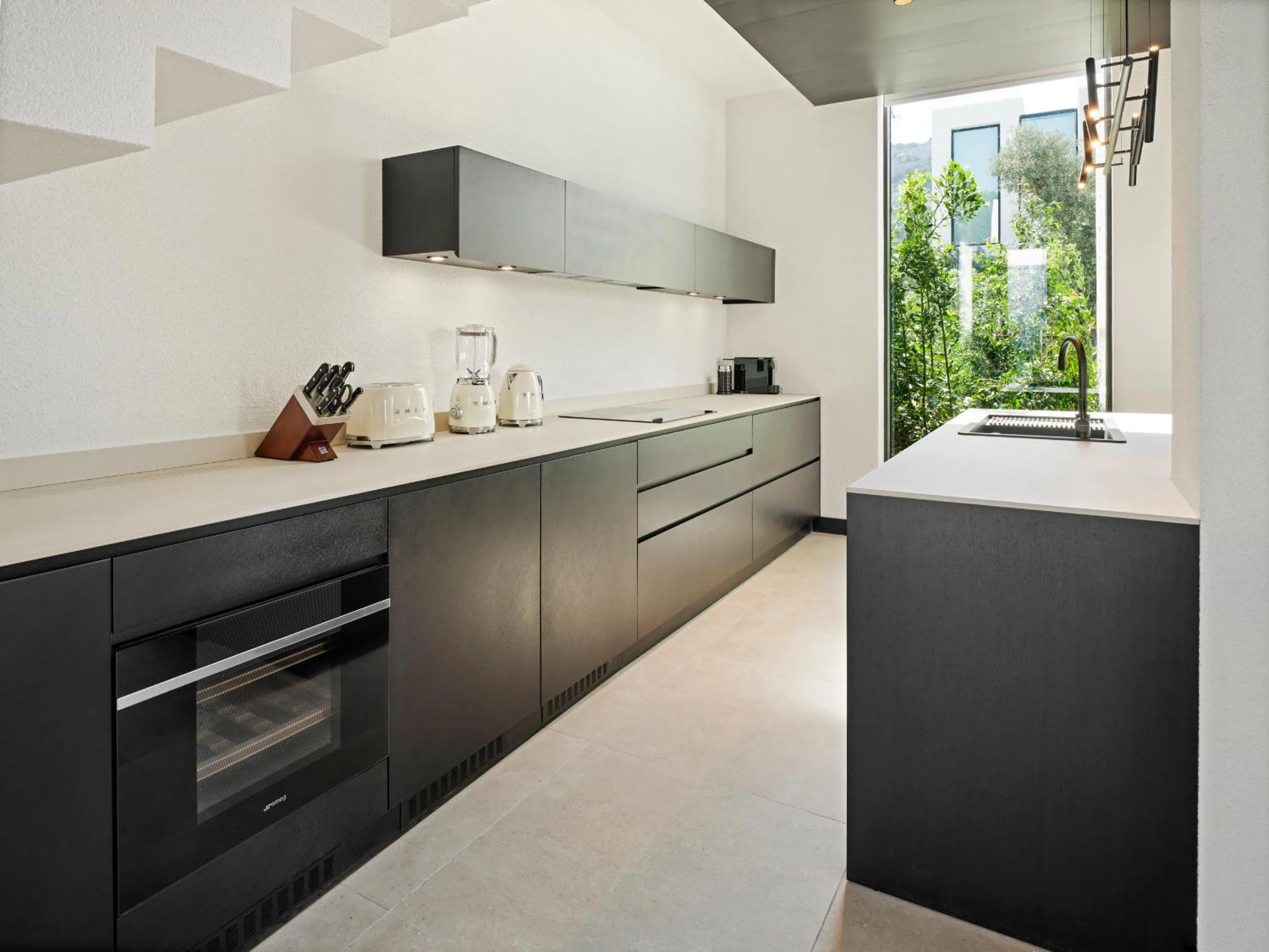 kitchen in Caja by Maxx Royal