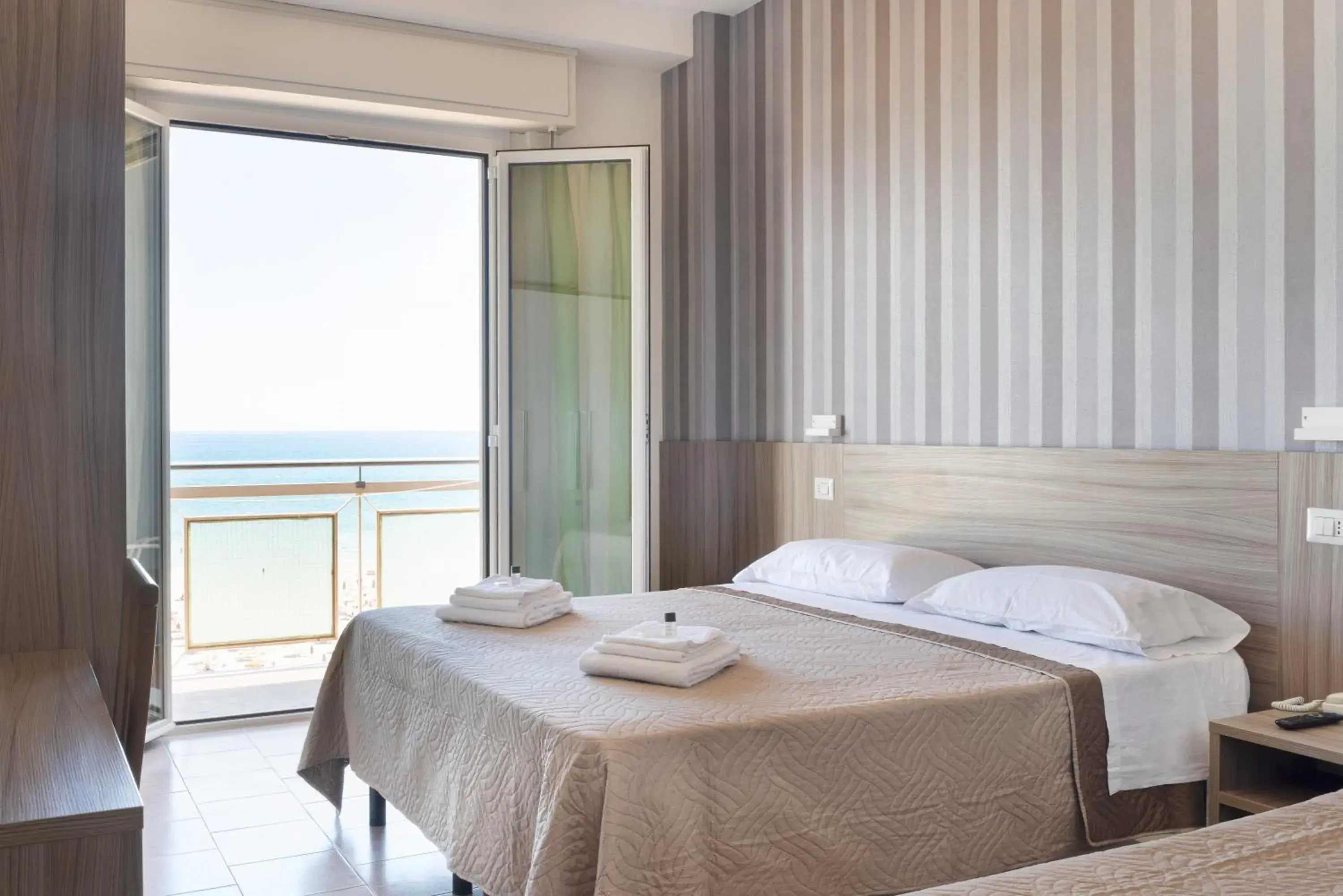 Triple Room with Sea View in Hotel Centrale Miramare Triple Room with Sea View in Hotel Centrale Miramare