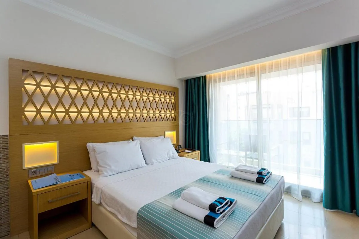 Bed in Aurasia Design Hotel