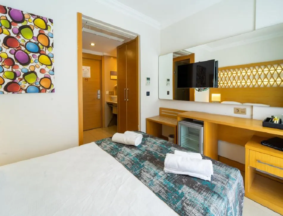 Bed in Aurasia Design Hotel