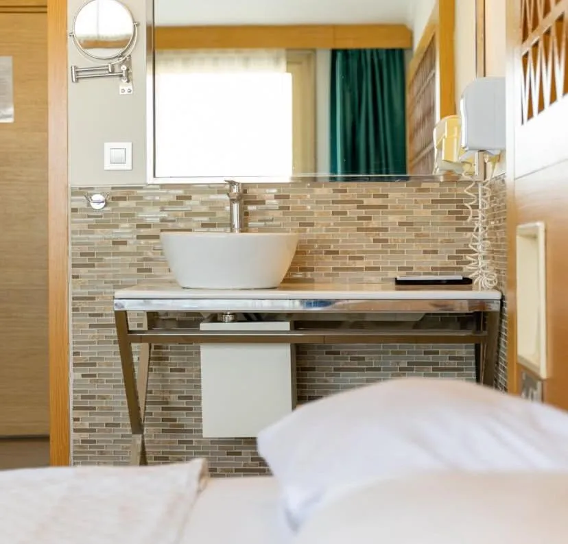 Bed in Aurasia Design Hotel