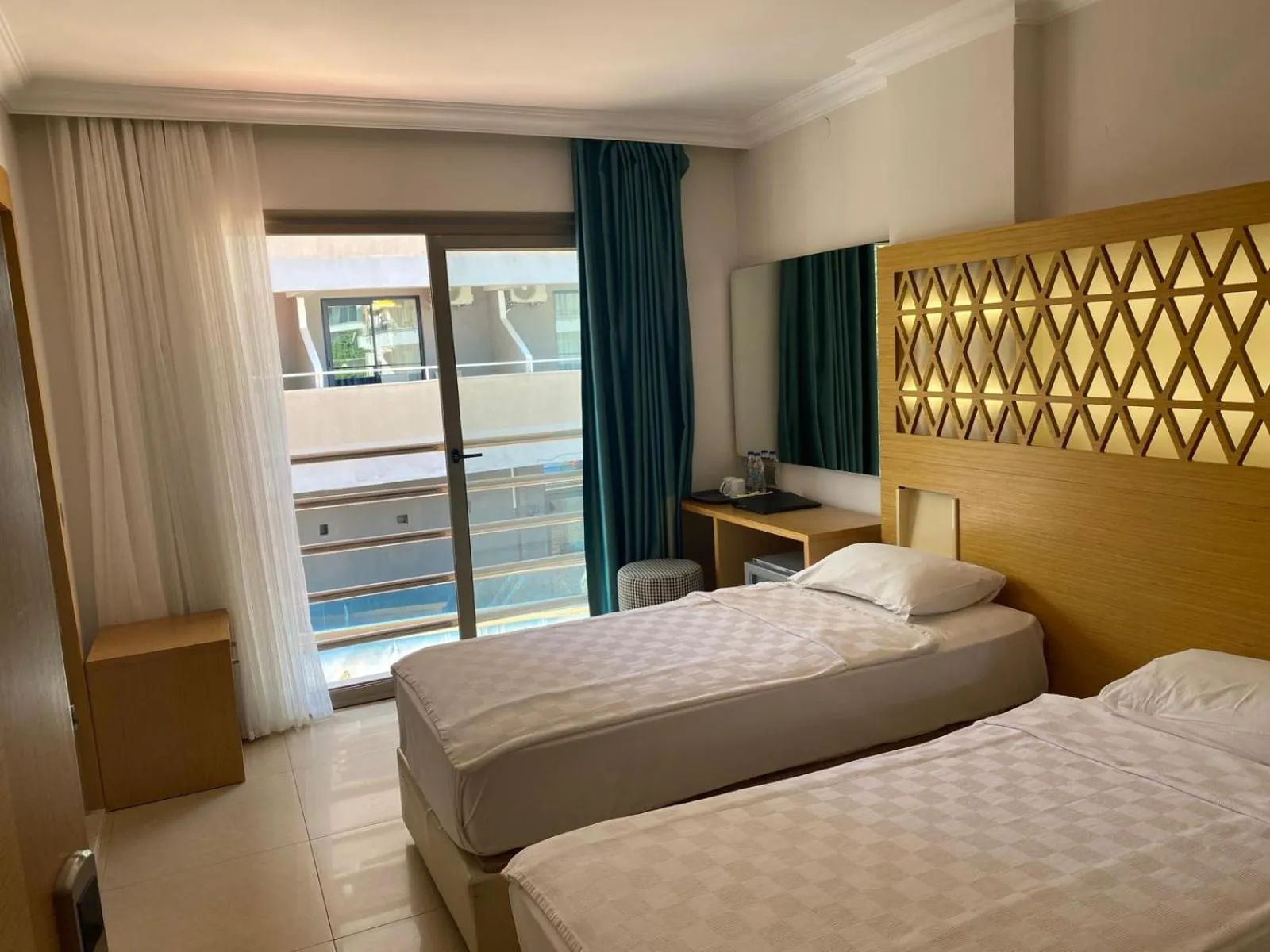 Bed in Aurasia Design Hotel