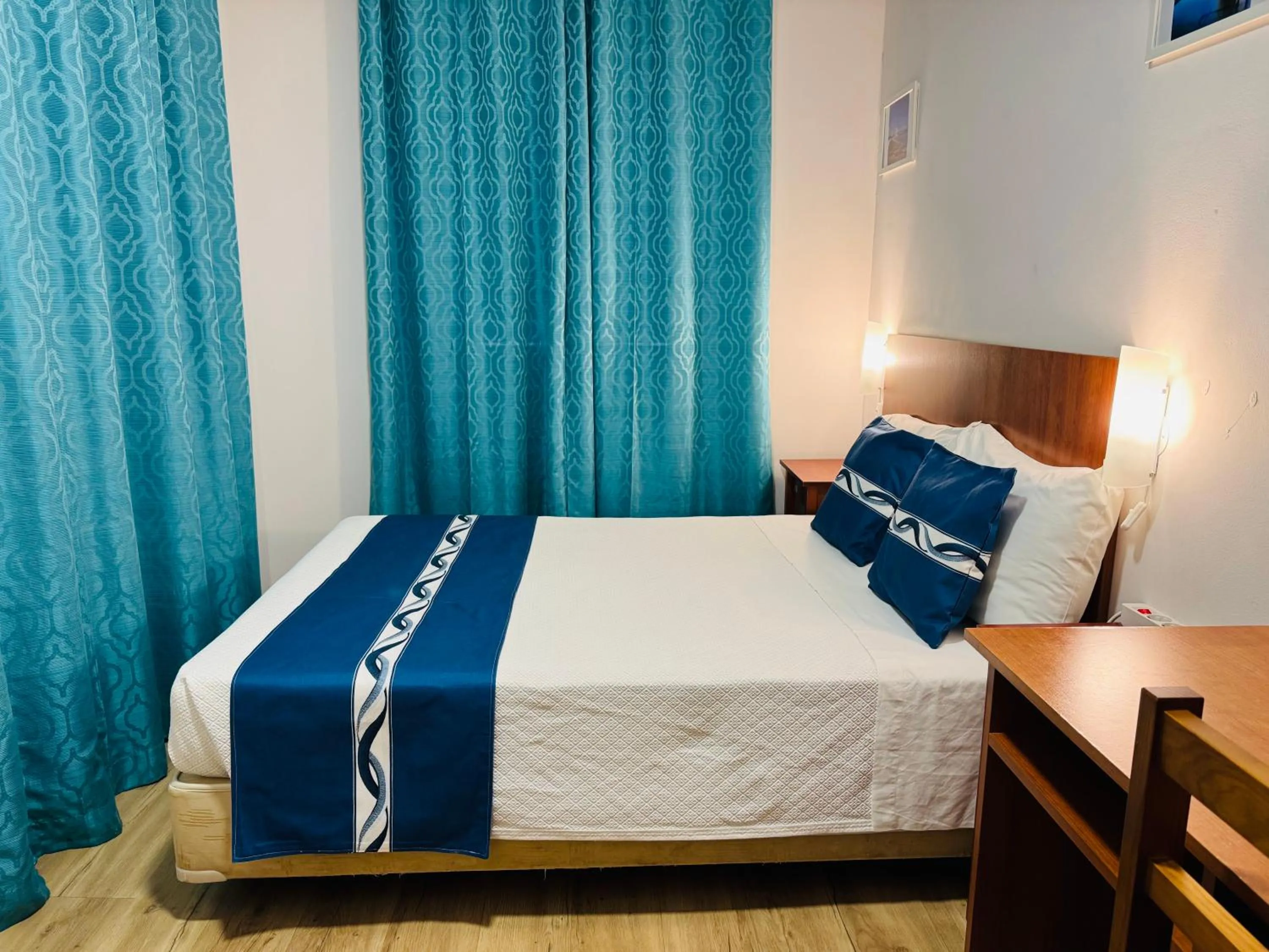 Bed in Residencial Camoes