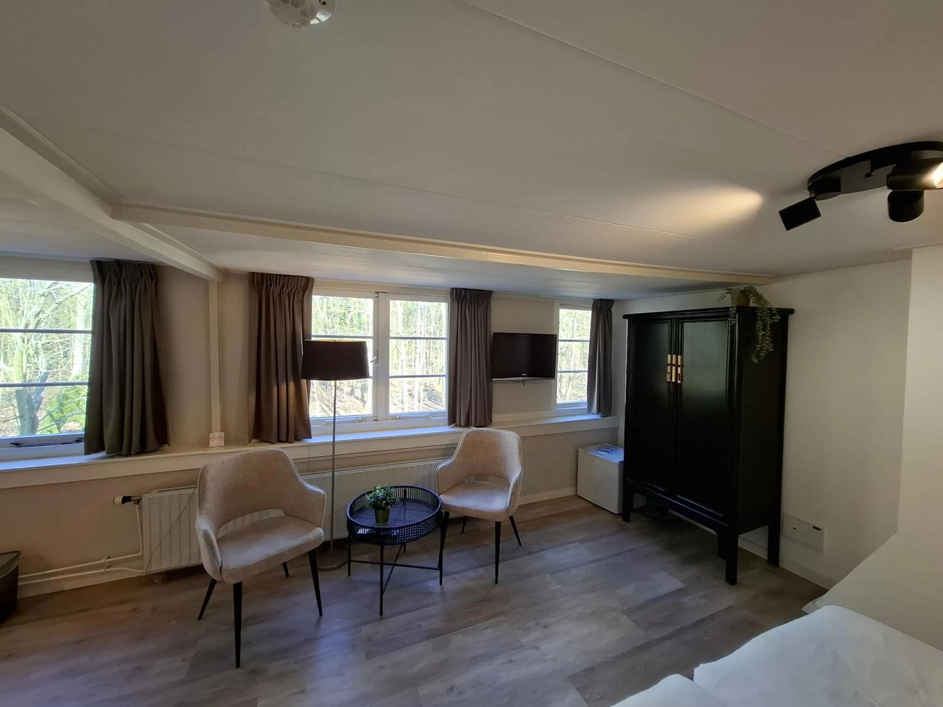 Seating area, Bed in Hotel Randduin