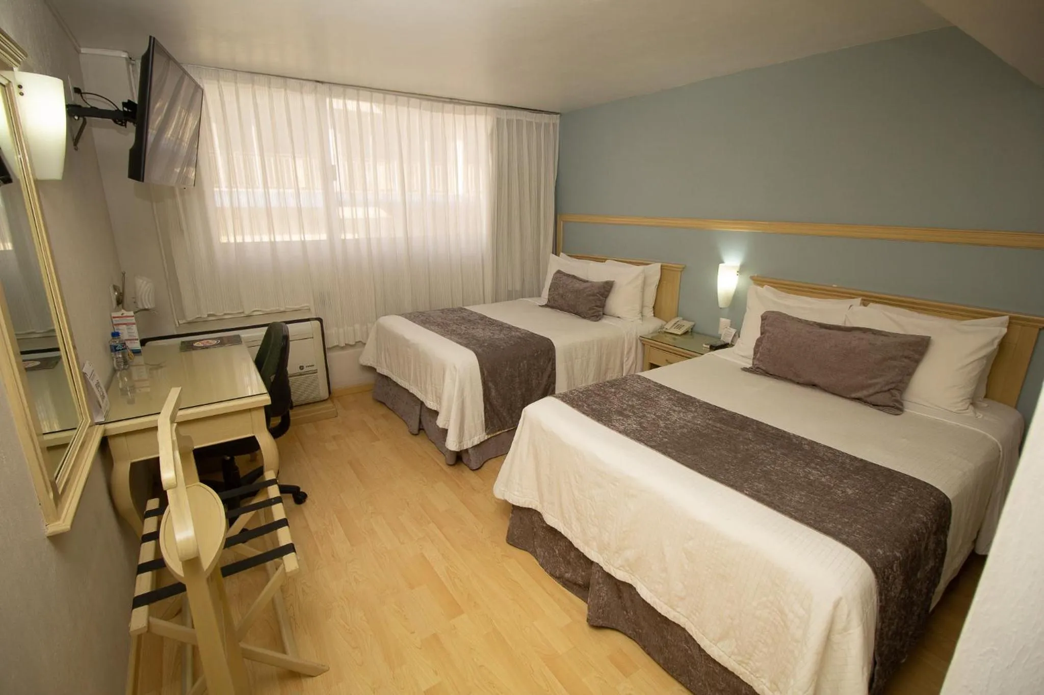 Bed in Hoteles Piedra Alta by De Los Perez