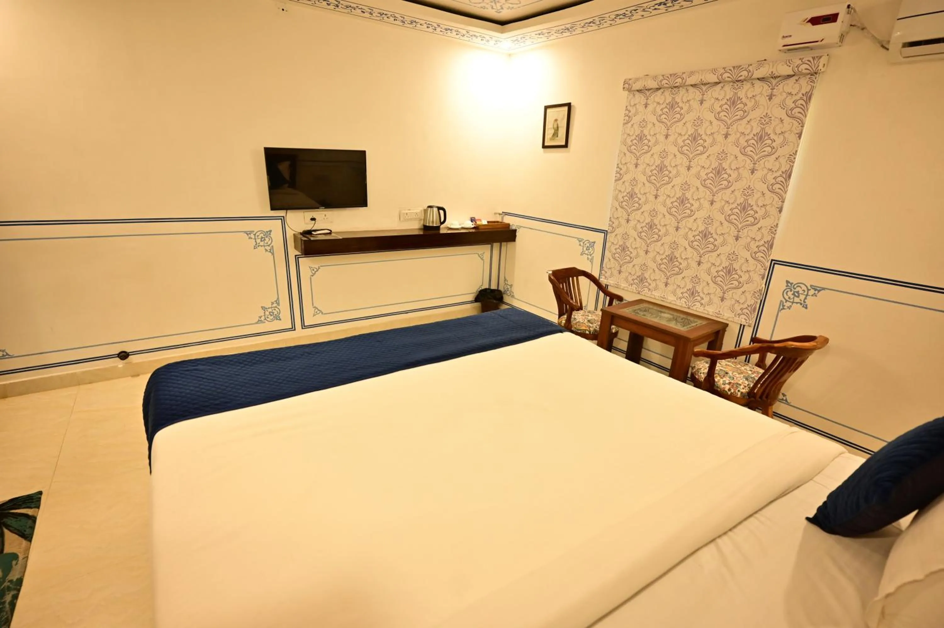 Bed in The castle crown - Hem Vilas Resort Ranthambhore