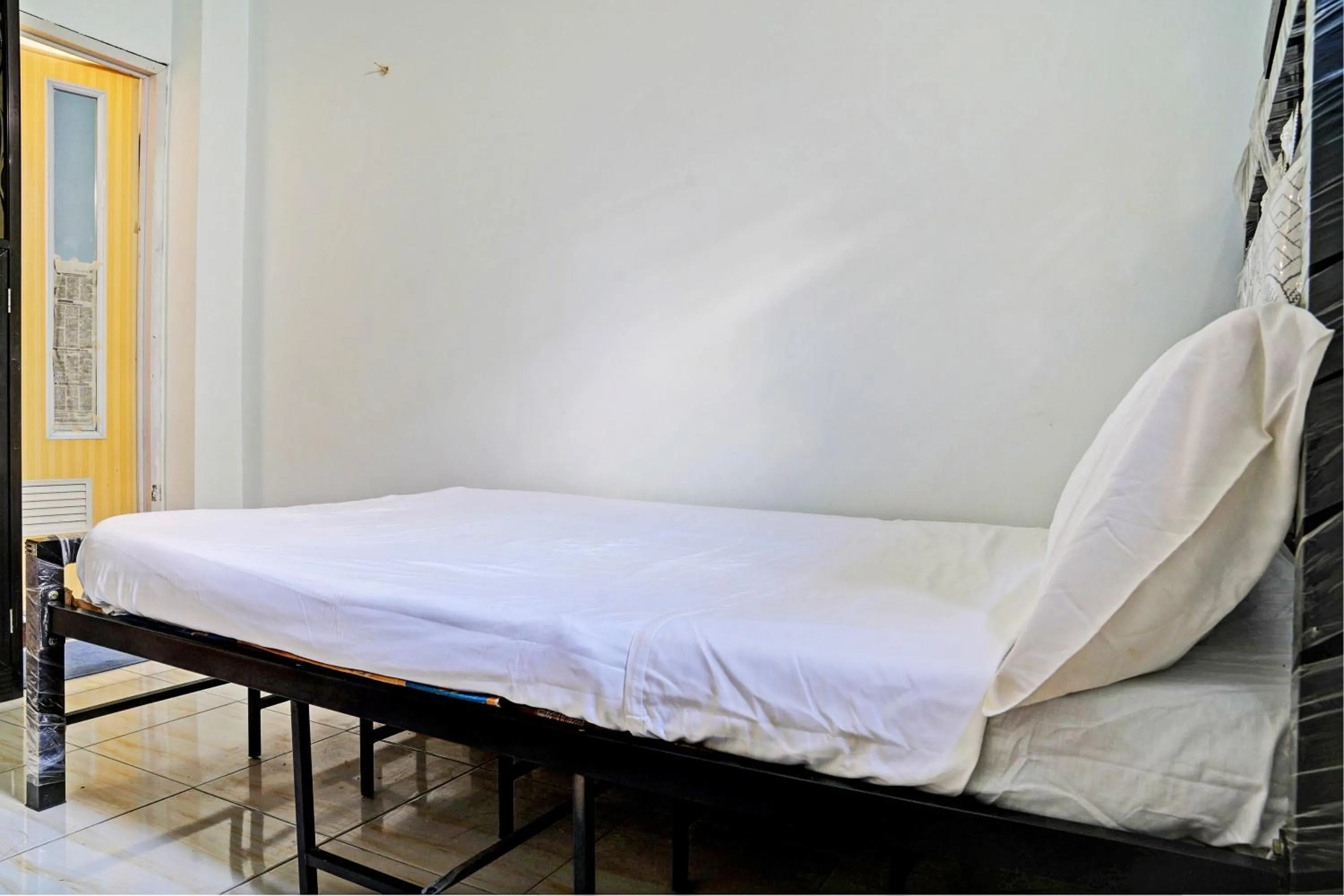 Bedroom in Hotel O Penginapan Hj Lilis 2 Syariah