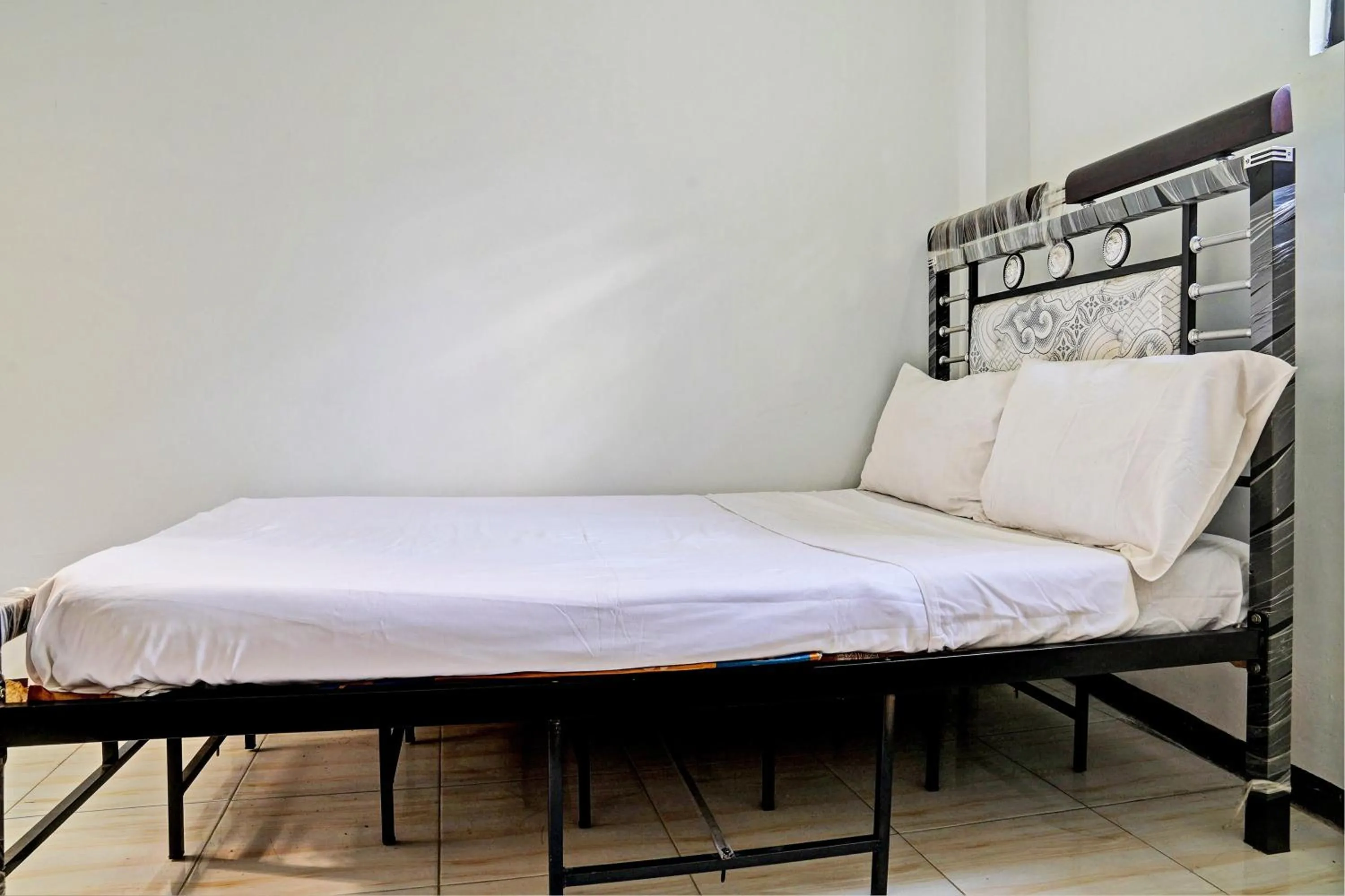 Bedroom in Hotel O Penginapan Hj Lilis 2 Syariah