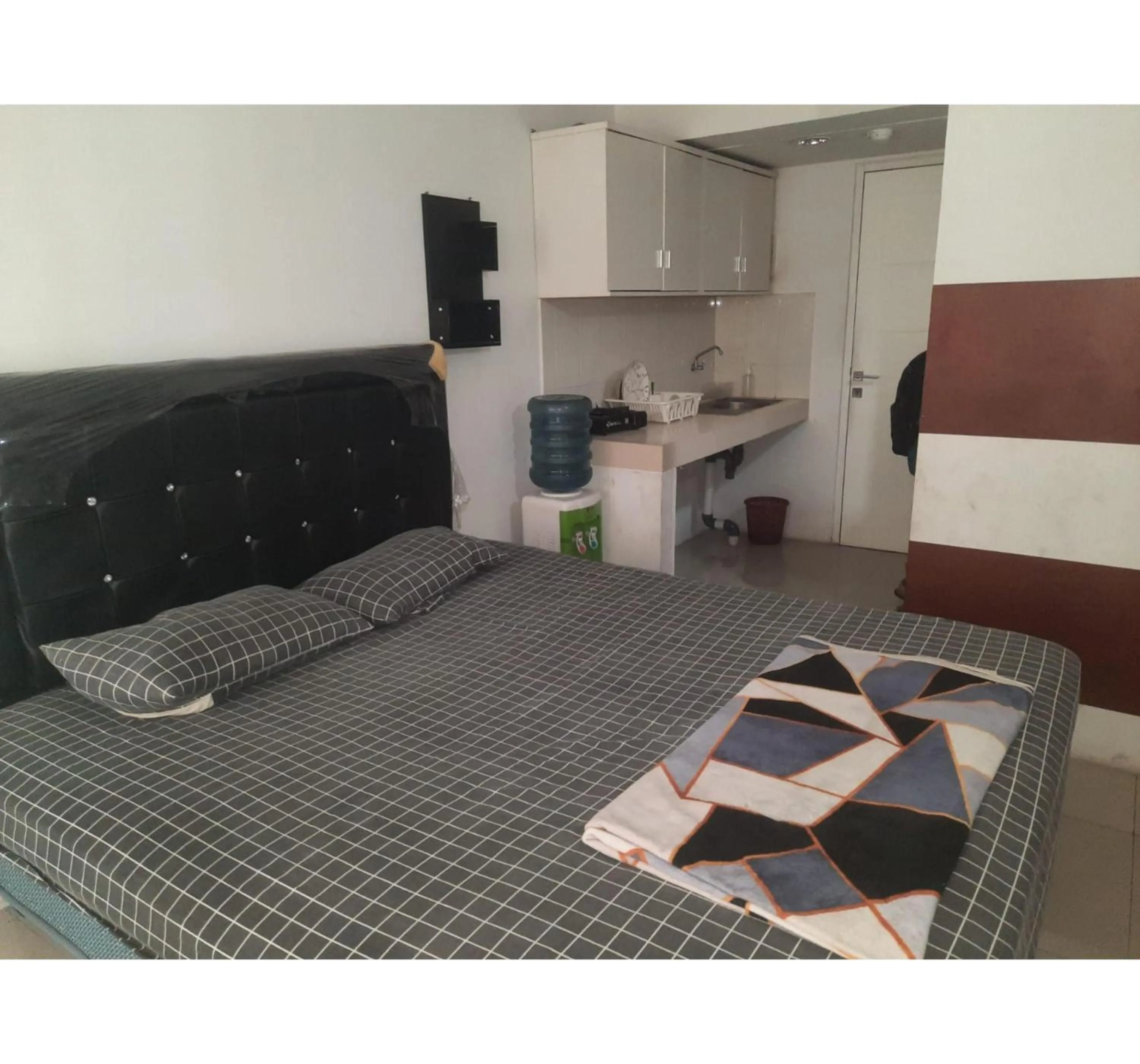 Bedroom in Hotel O Apartemen Grand Sentraland by Mira