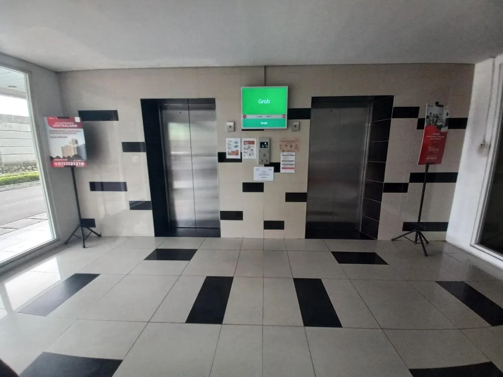 Lobby or reception in Hotel O Apartement Sentraland Karawang By Gs