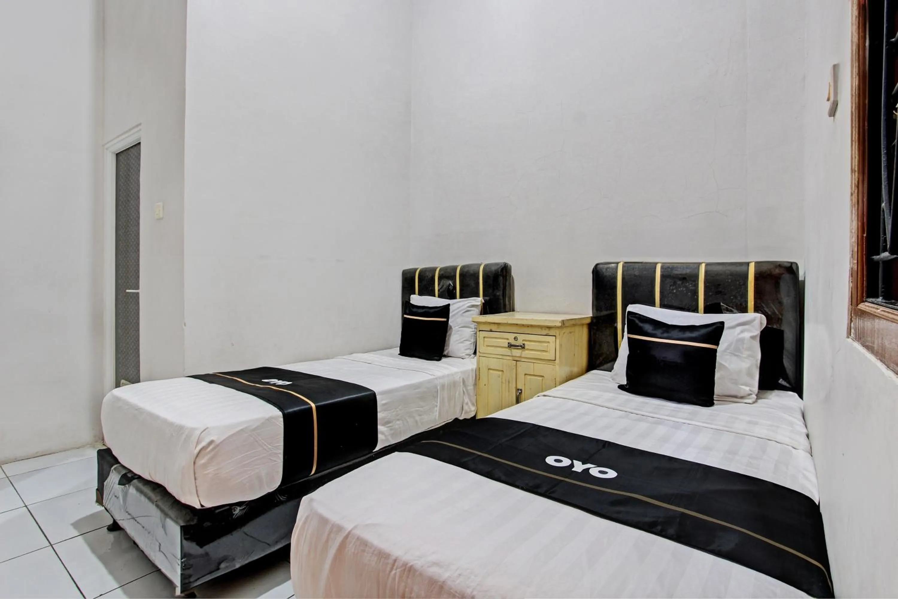 Bedroom, Bed in Capital O 93361 Dynasty Inn Syariah