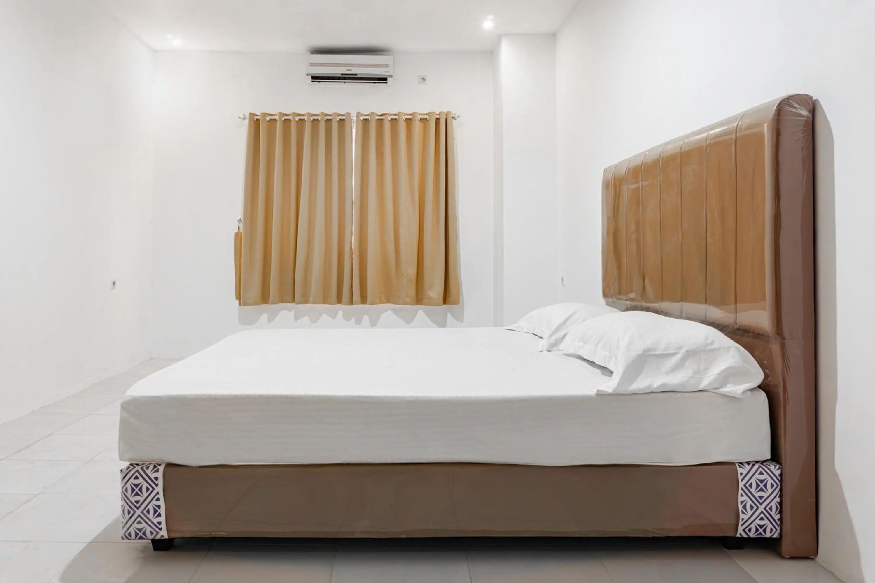 Bedroom, Bed in Hotel O Enjoy Homestay & Cafe