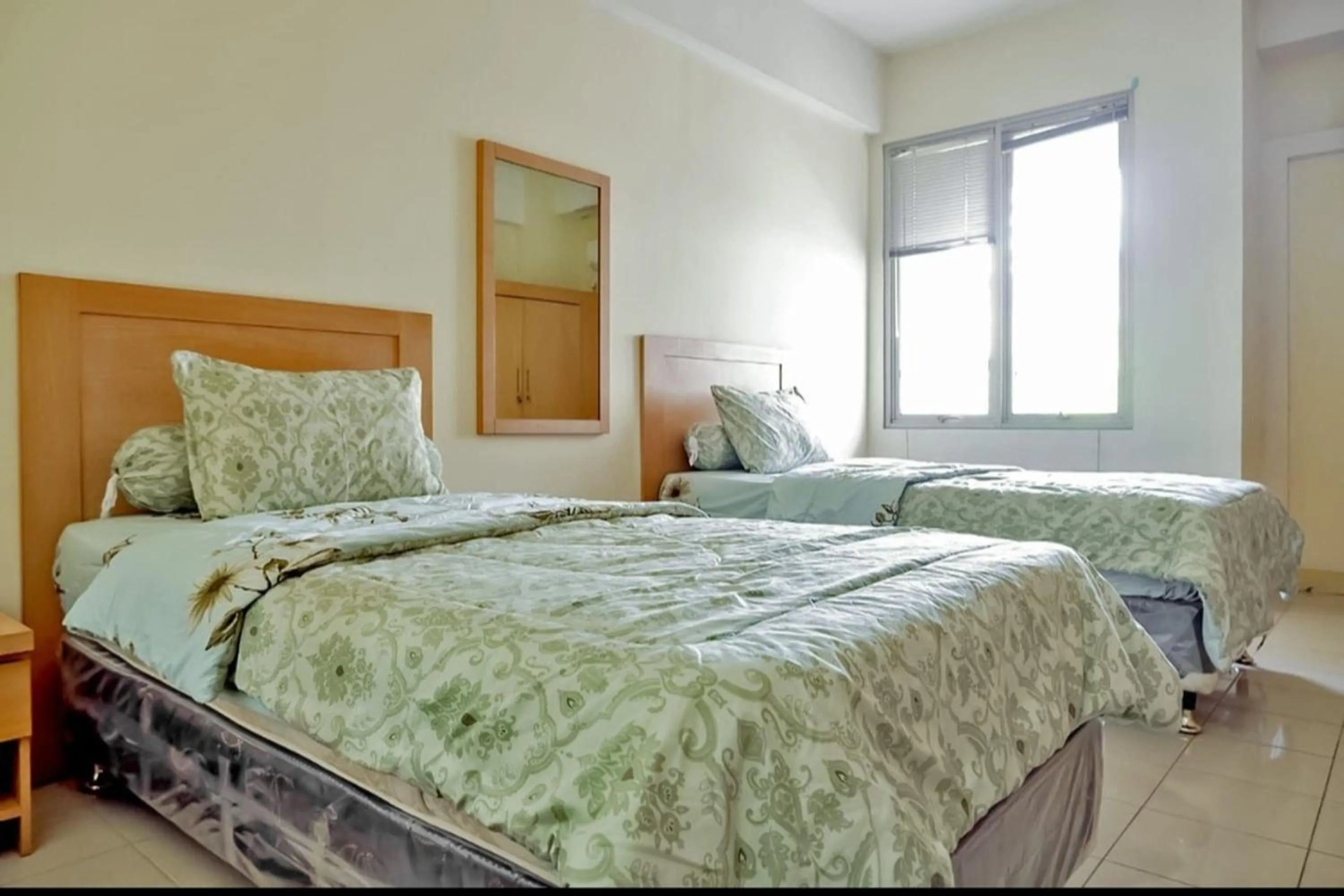 Photo of the whole room, Bed in OYO Life 93383 Wisma Kencana Puteri