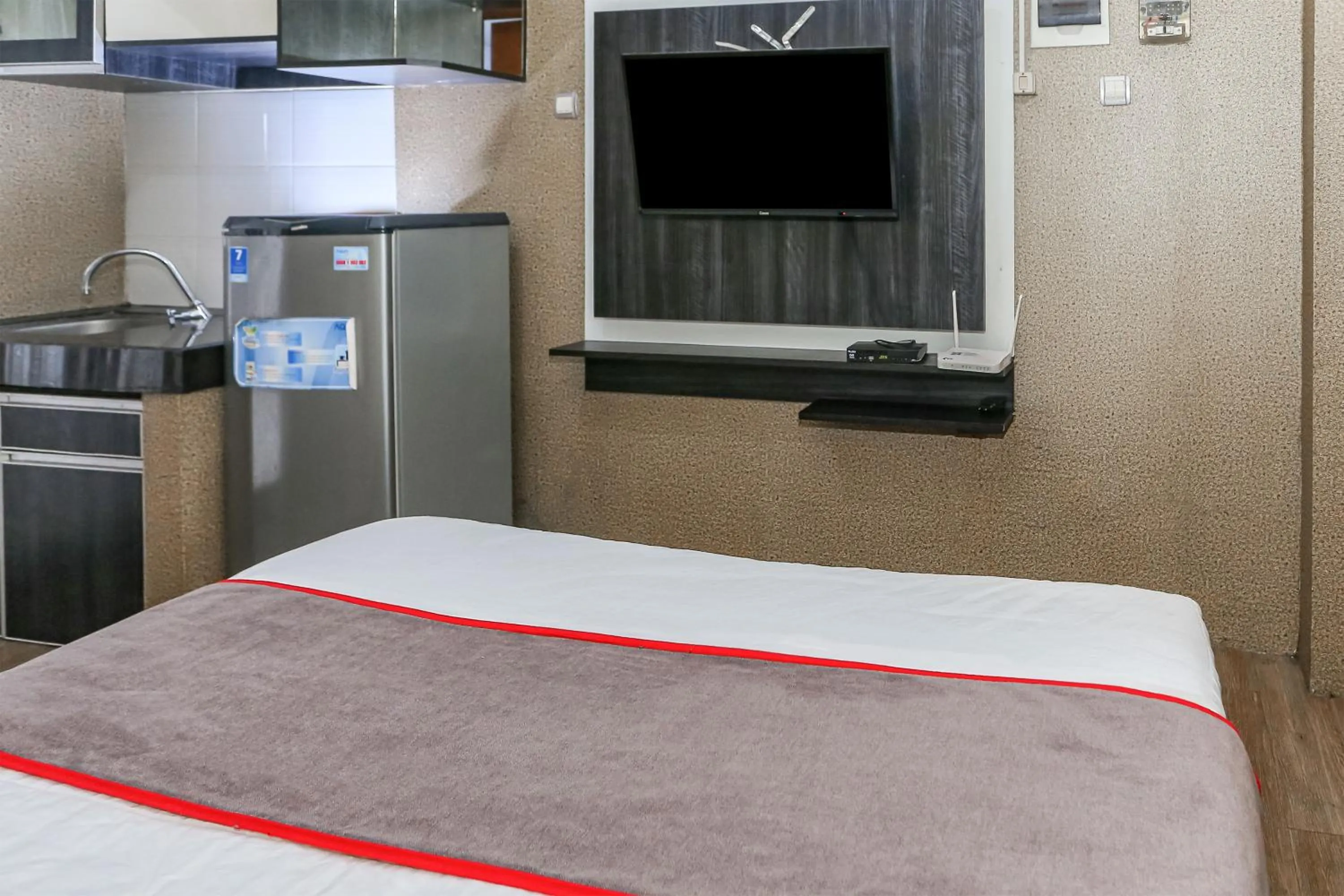 Bedroom, Bed in Capital O 93372 Aurora Residence