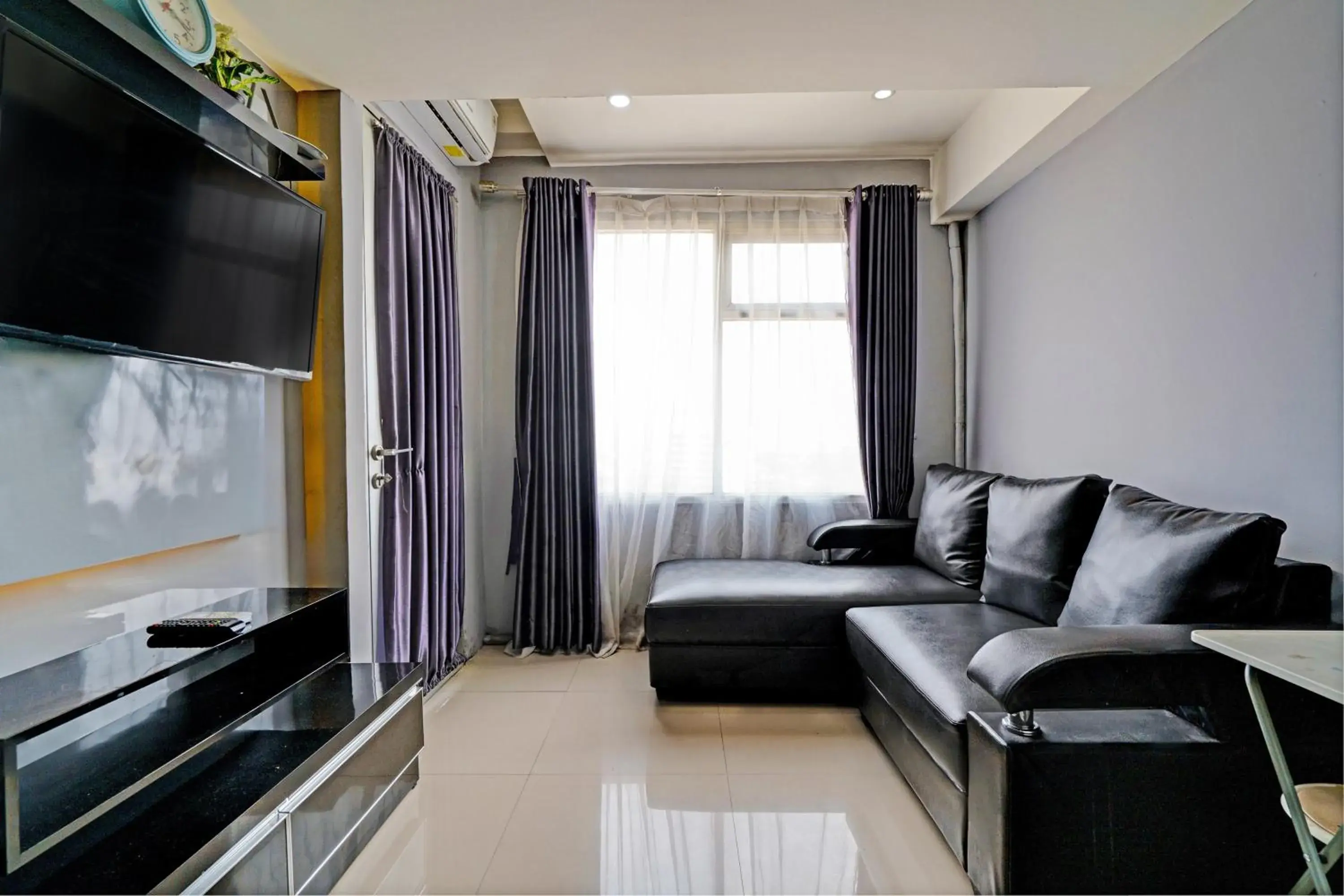 Bedroom in Hotel O Apartement Grand Sentraland By Rai Property Bedroom in Hotel O Apartement Grand Sentraland By Rai Property