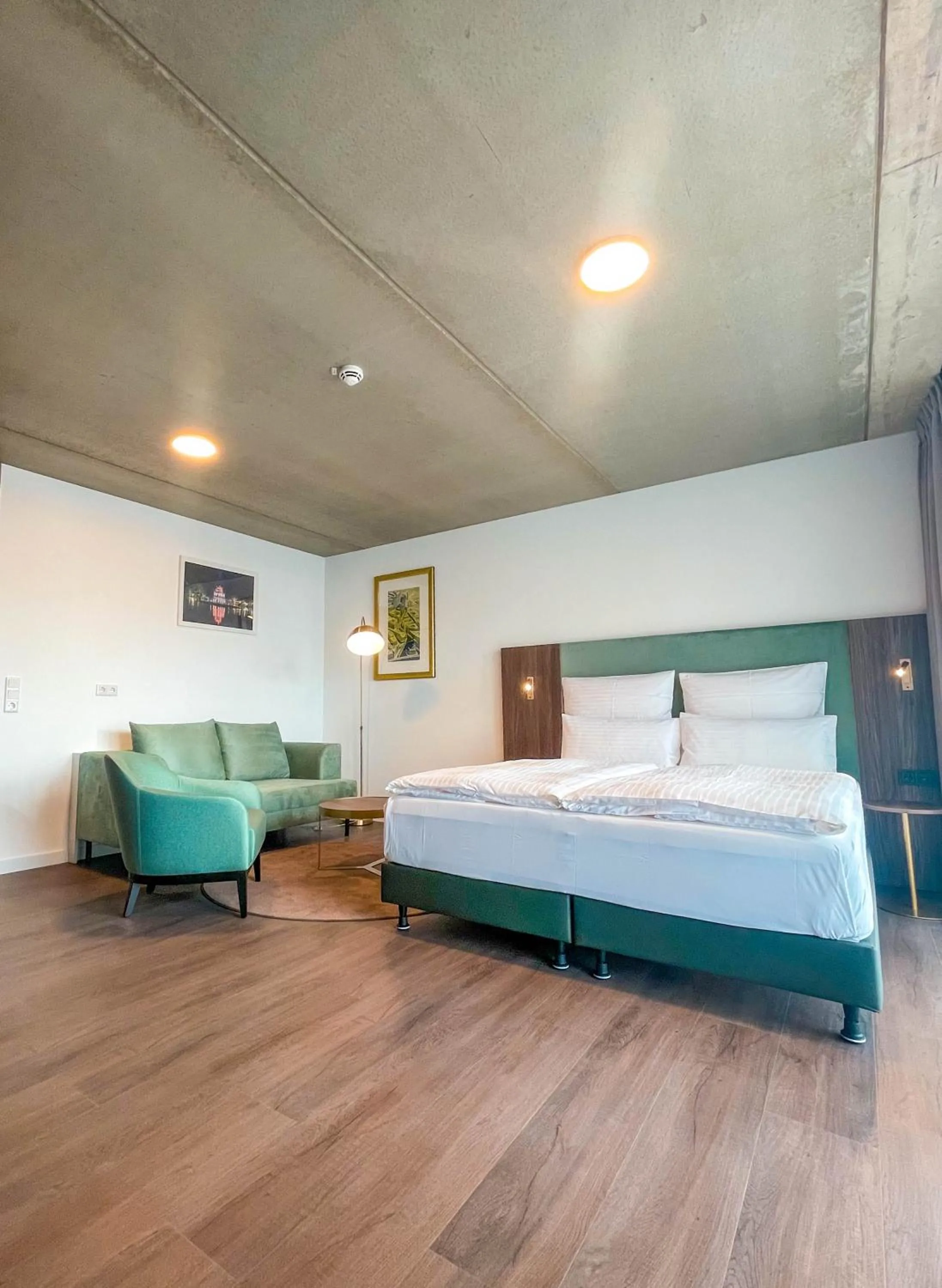 Bed in DX Apartments