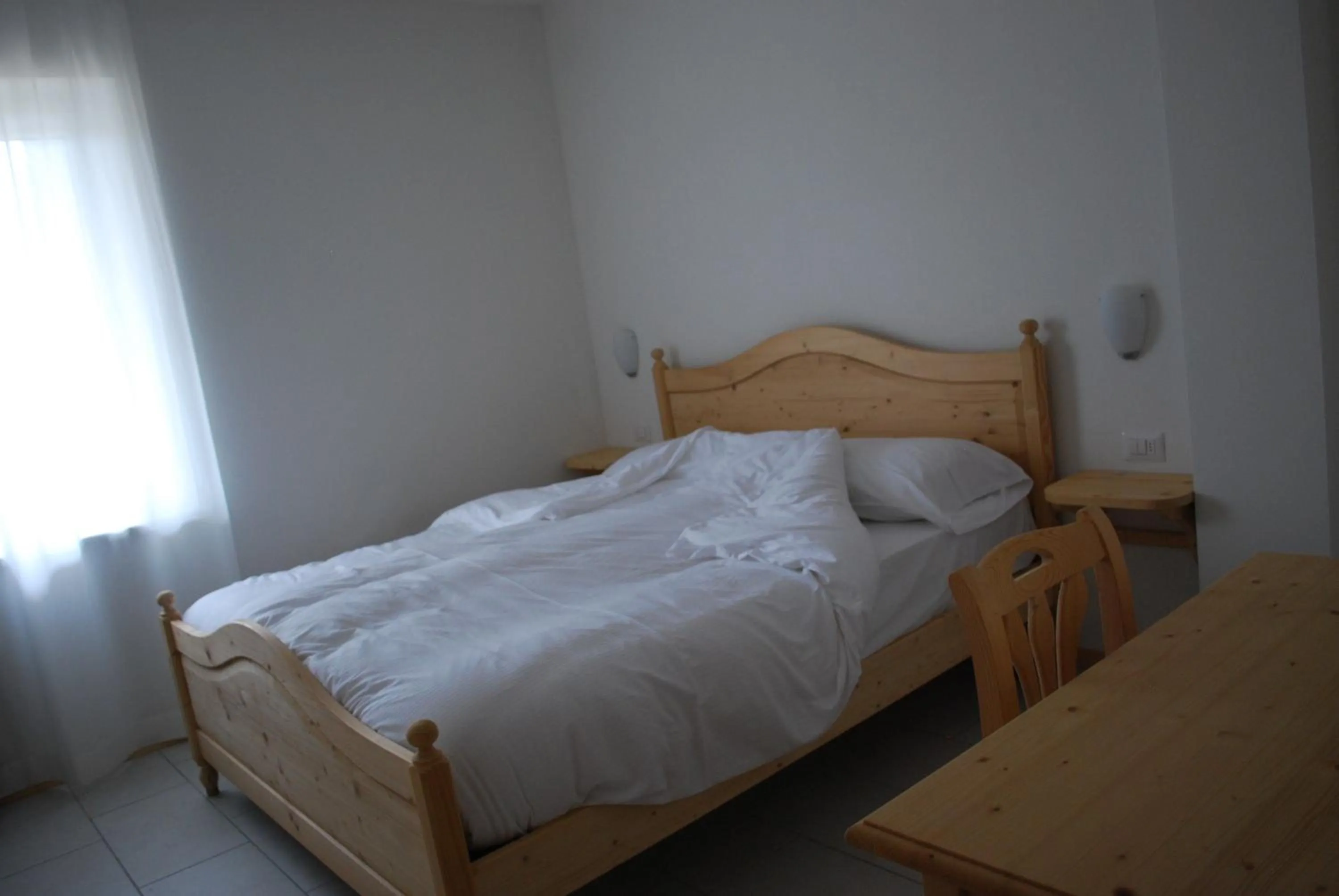 Decorative detail, Bed in Hotel Elbele Garnì