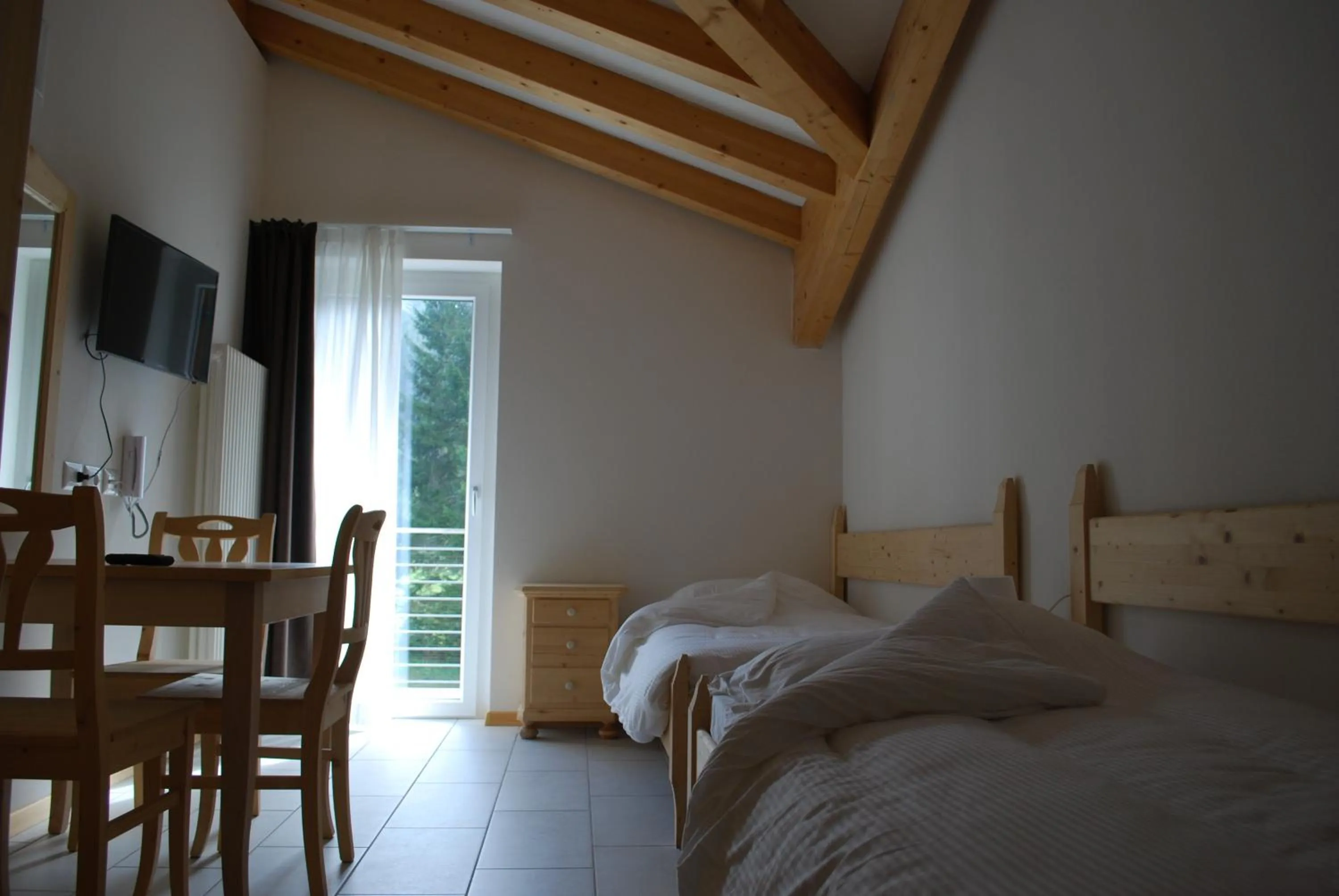 TV and multimedia, Bed in Hotel Elbele Garnì