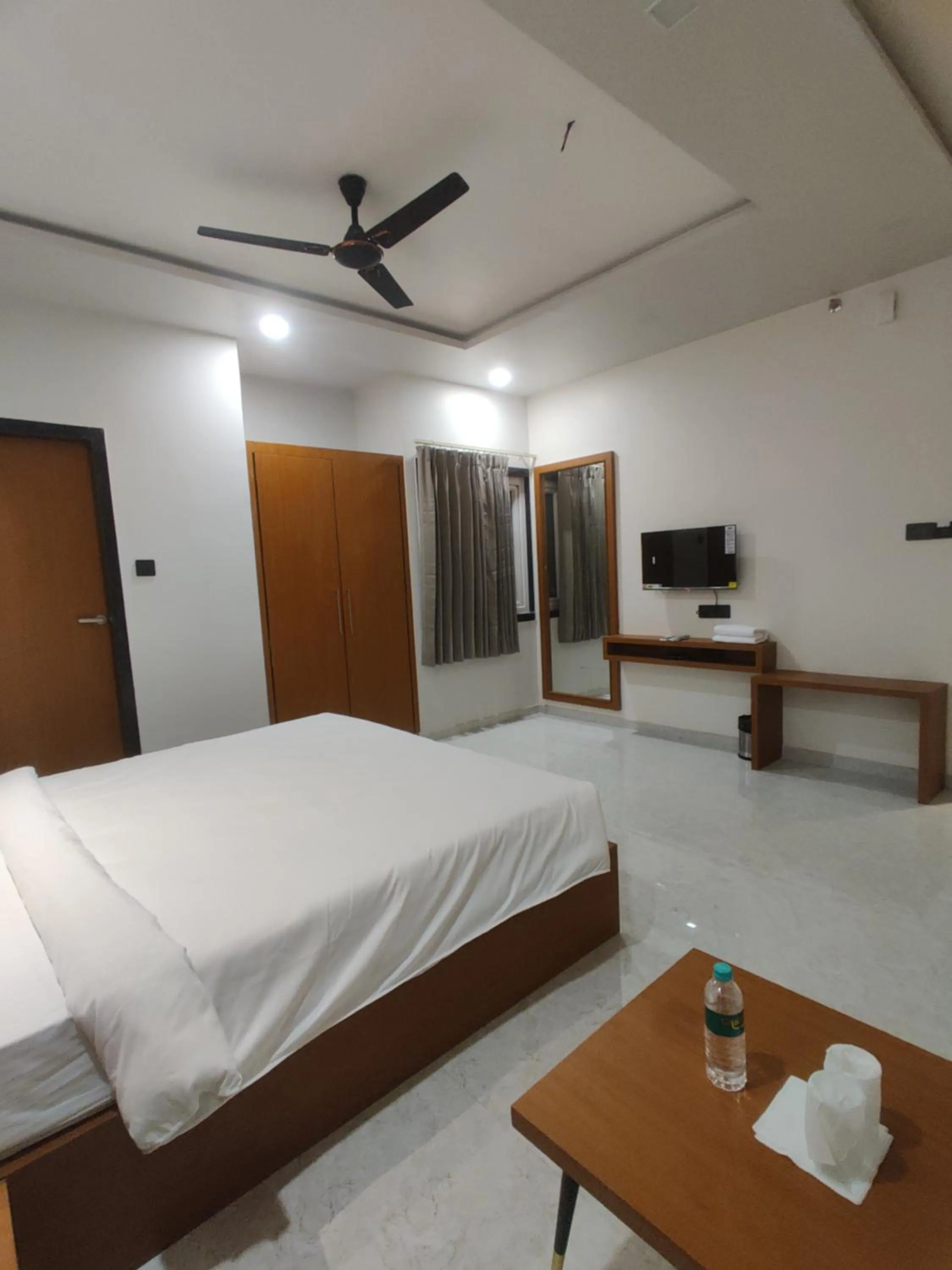 Communal lounge/ TV room, Bed in Hotel Pride Of Chittor