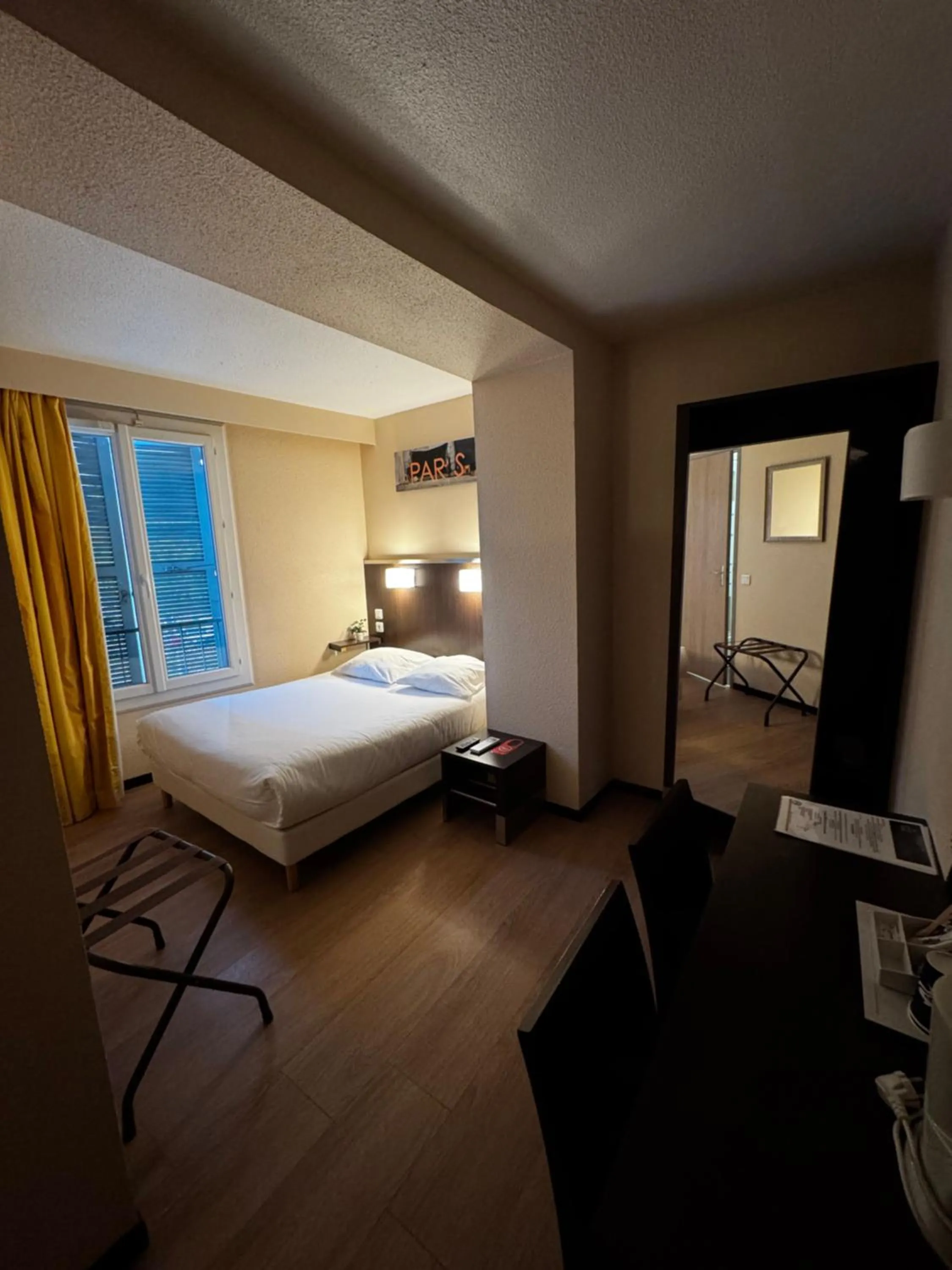 Bed in Hôtel Au Petit Caporal