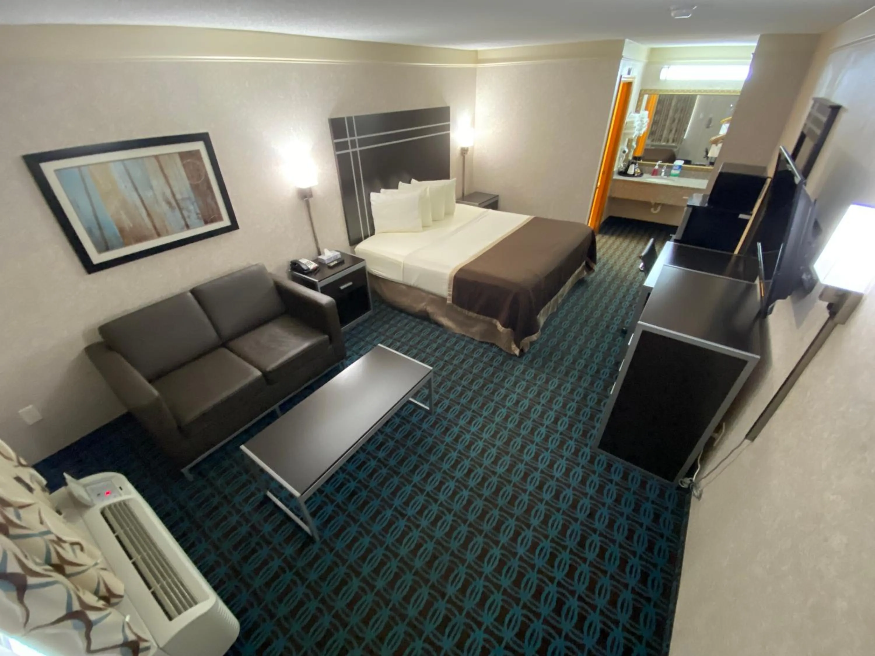 Bed in Deluxe Inn - Fayetteville I-95