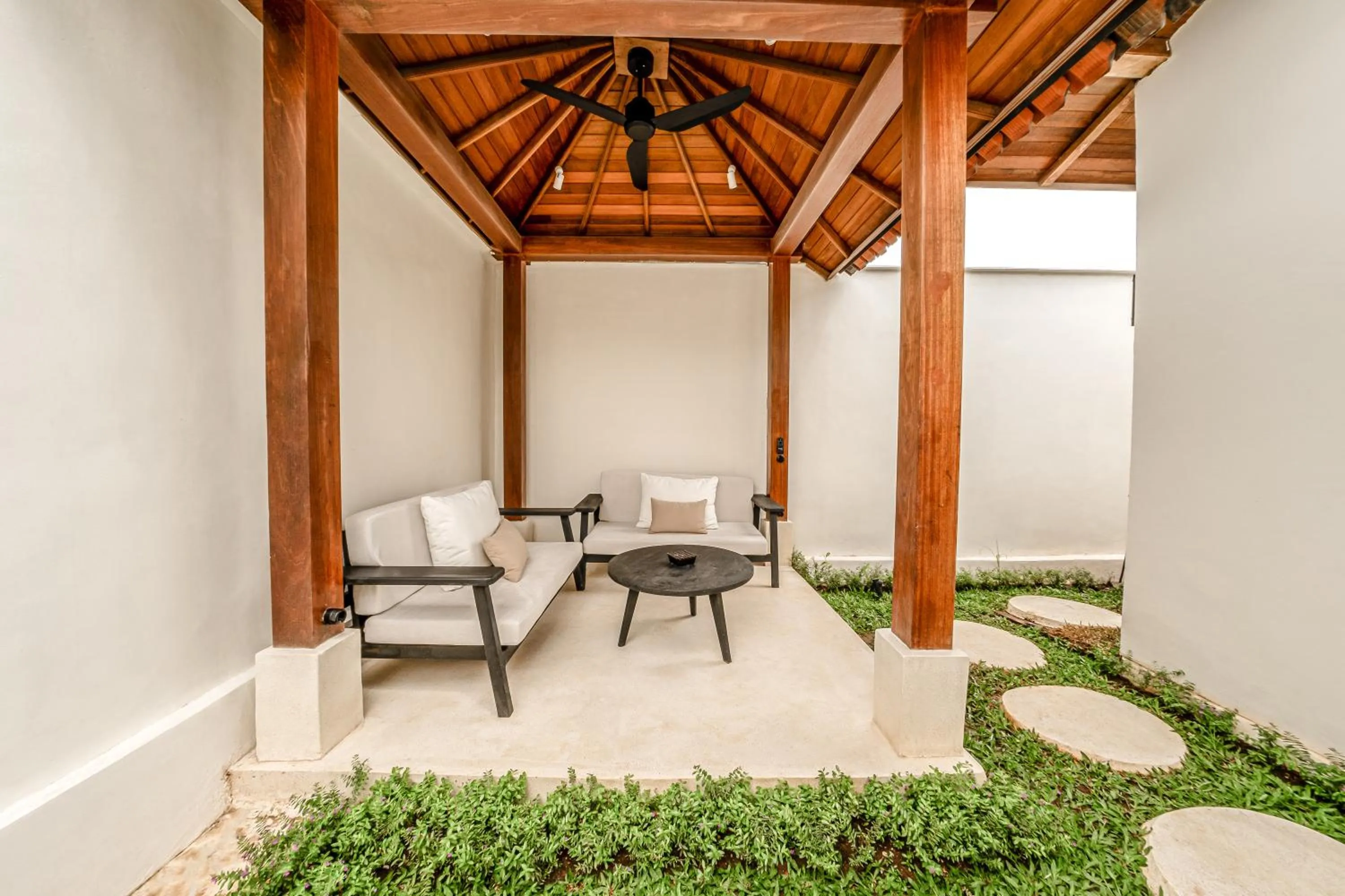 Patio in Sarang Apartments by EVDEkimi - Rice field escape with Yoga lounge, Lush garden - Long stay extras