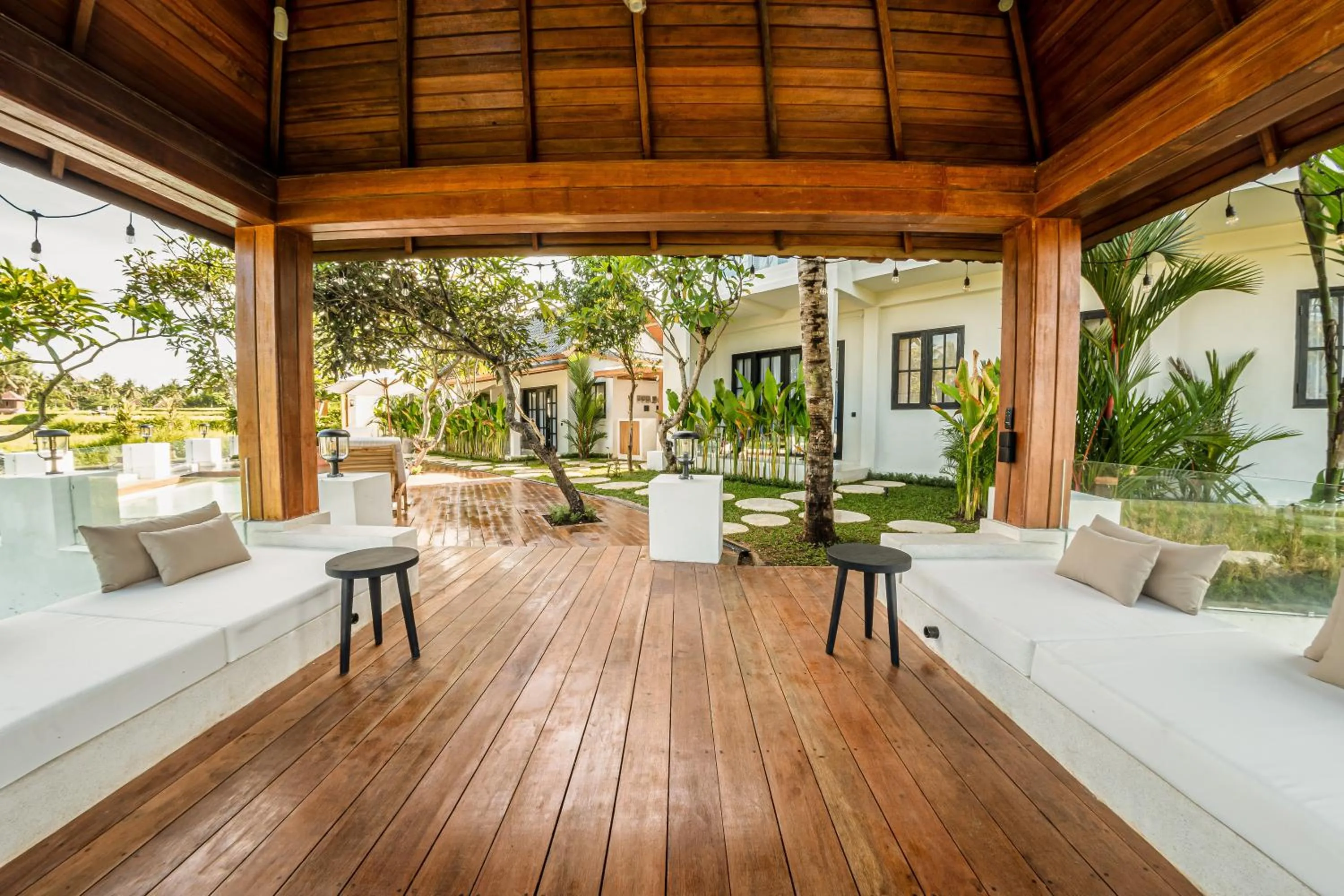 Property building in Sarang Apartments by EVDEkimi - Rice field escape with Yoga lounge, Lush garden - Long stay extras