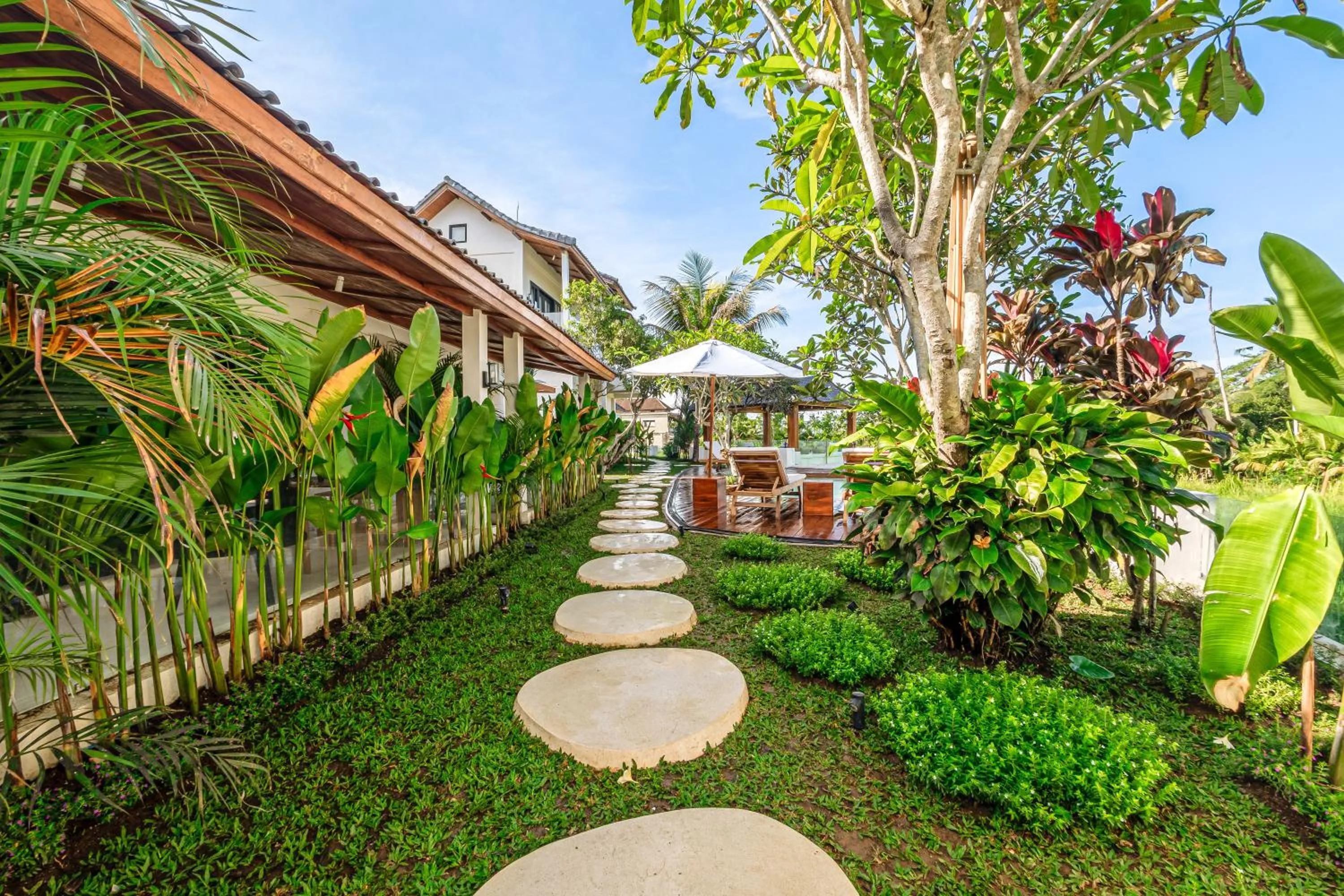 Property building in Sarang Apartments by EVDEkimi - Rice field escape with Yoga lounge, Lush garden - Long stay extras