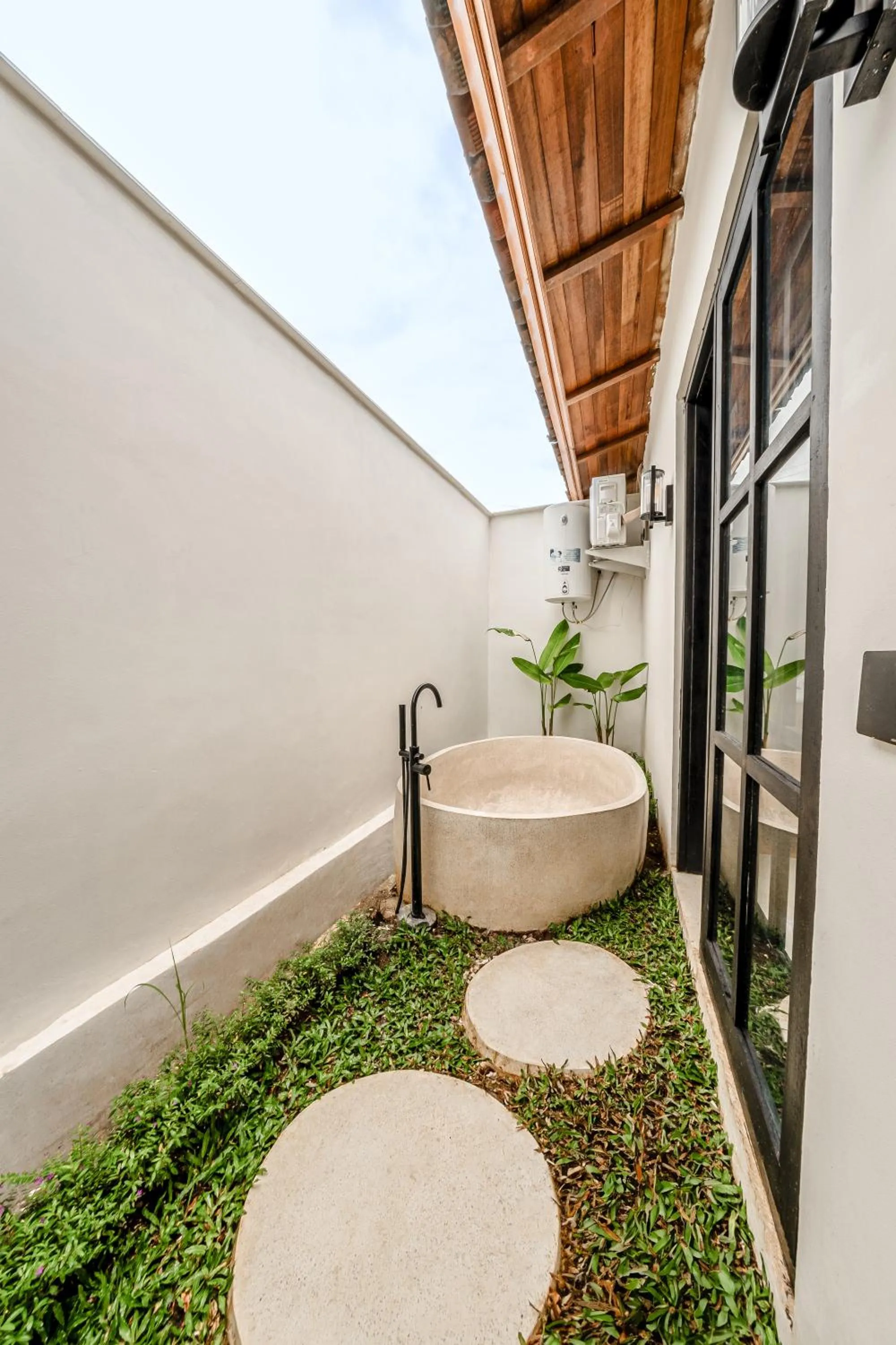 Patio in Sarang Apartments by EVDEkimi - Rice field escape with Yoga lounge, Lush garden - Long stay extras