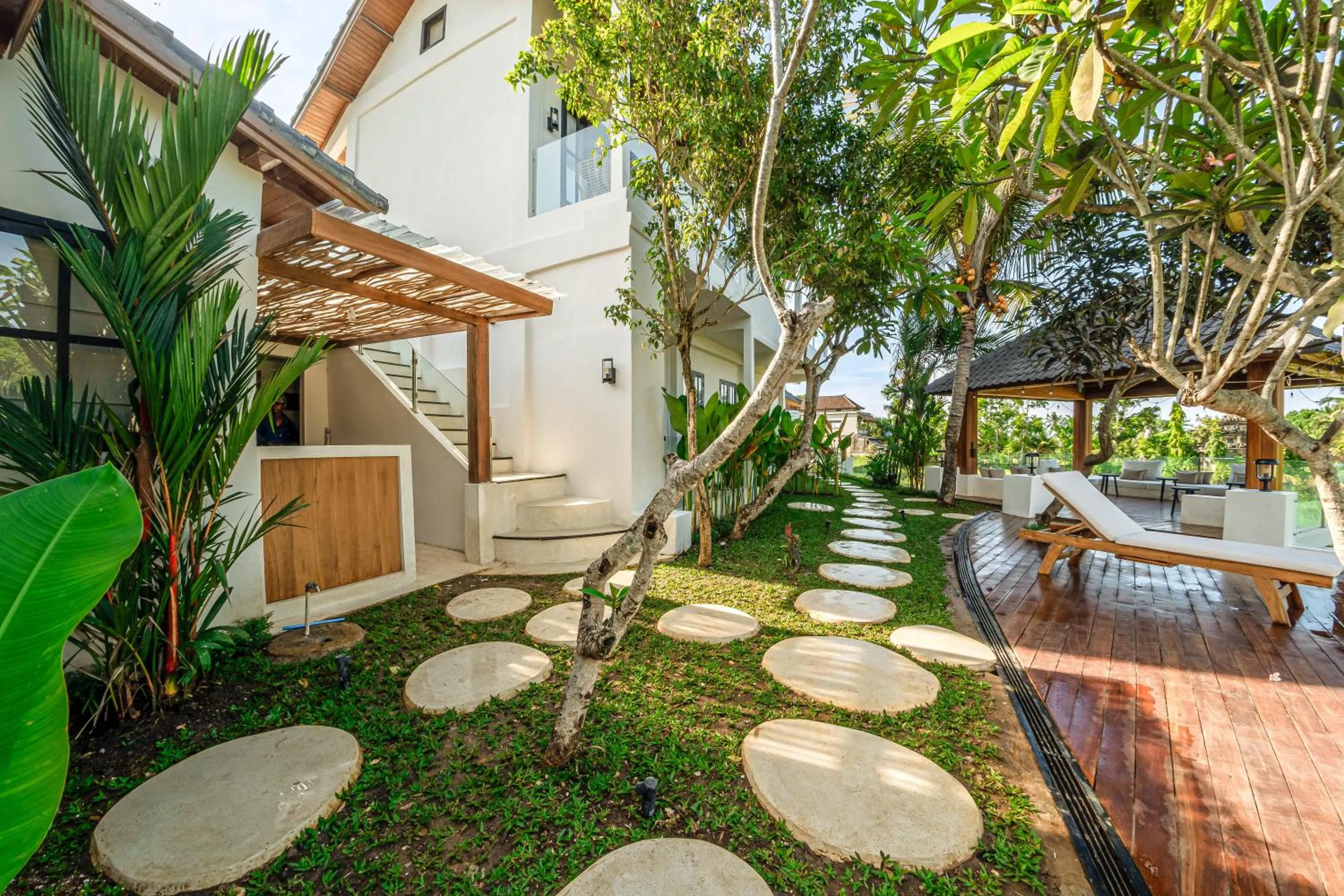 Property building in Sarang Apartments by EVDEkimi - Rice field escape with Yoga lounge, Lush garden - Long stay extras