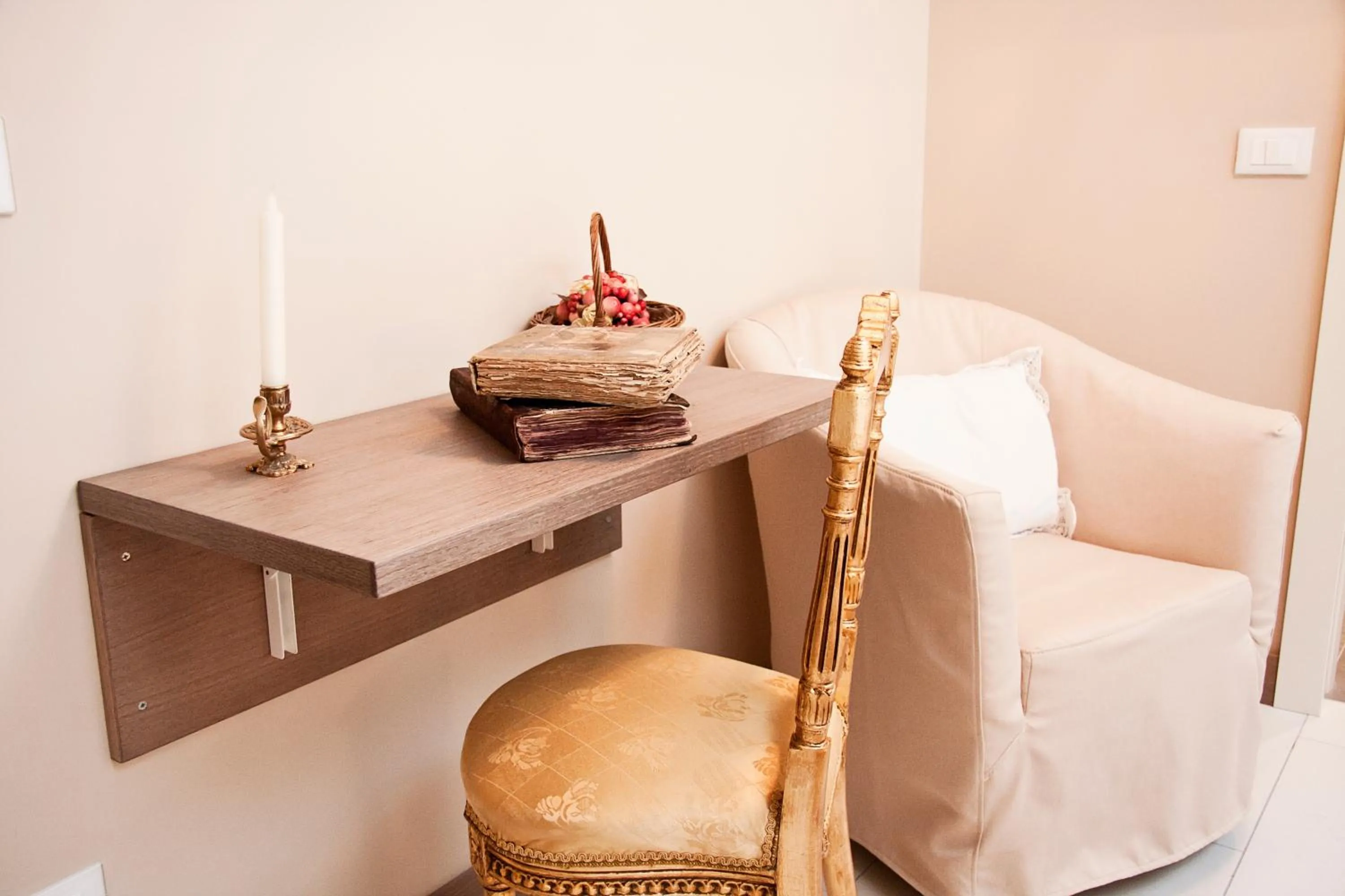 Seating area in La Castellana Loft Hotel