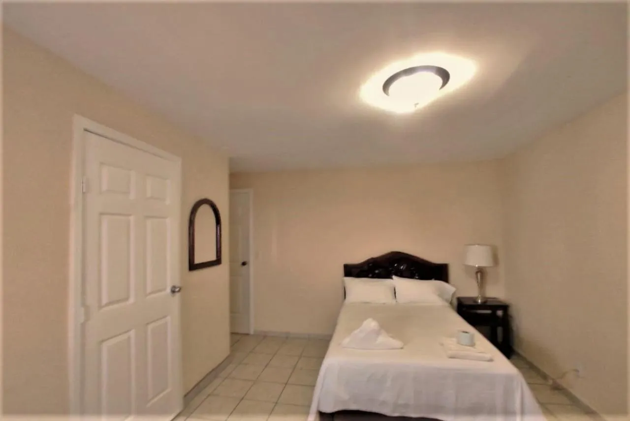 Bed in Hotel Paraíso del Pescador by Rotamundos