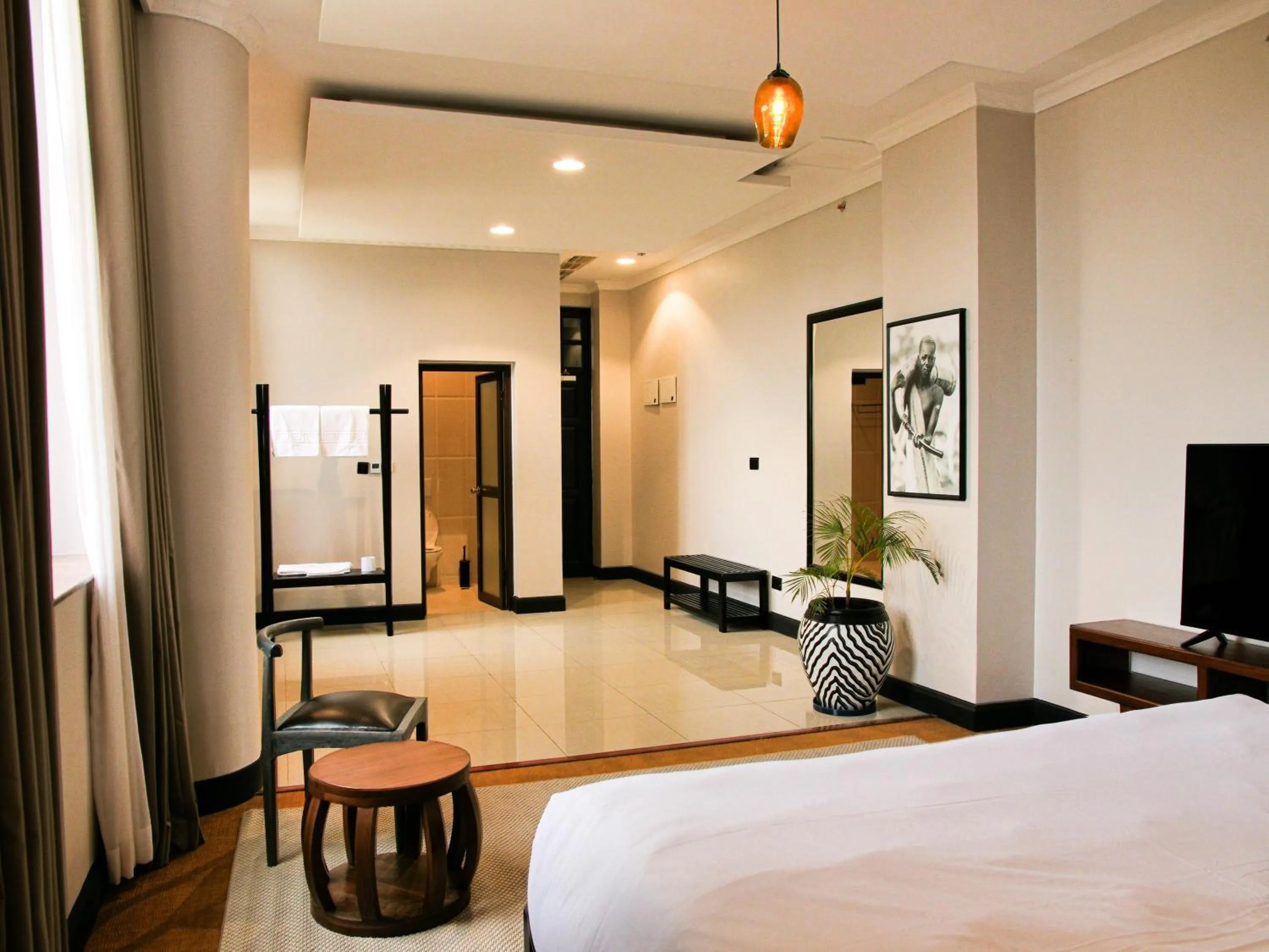 Bed in Sanna Boutique Hotel