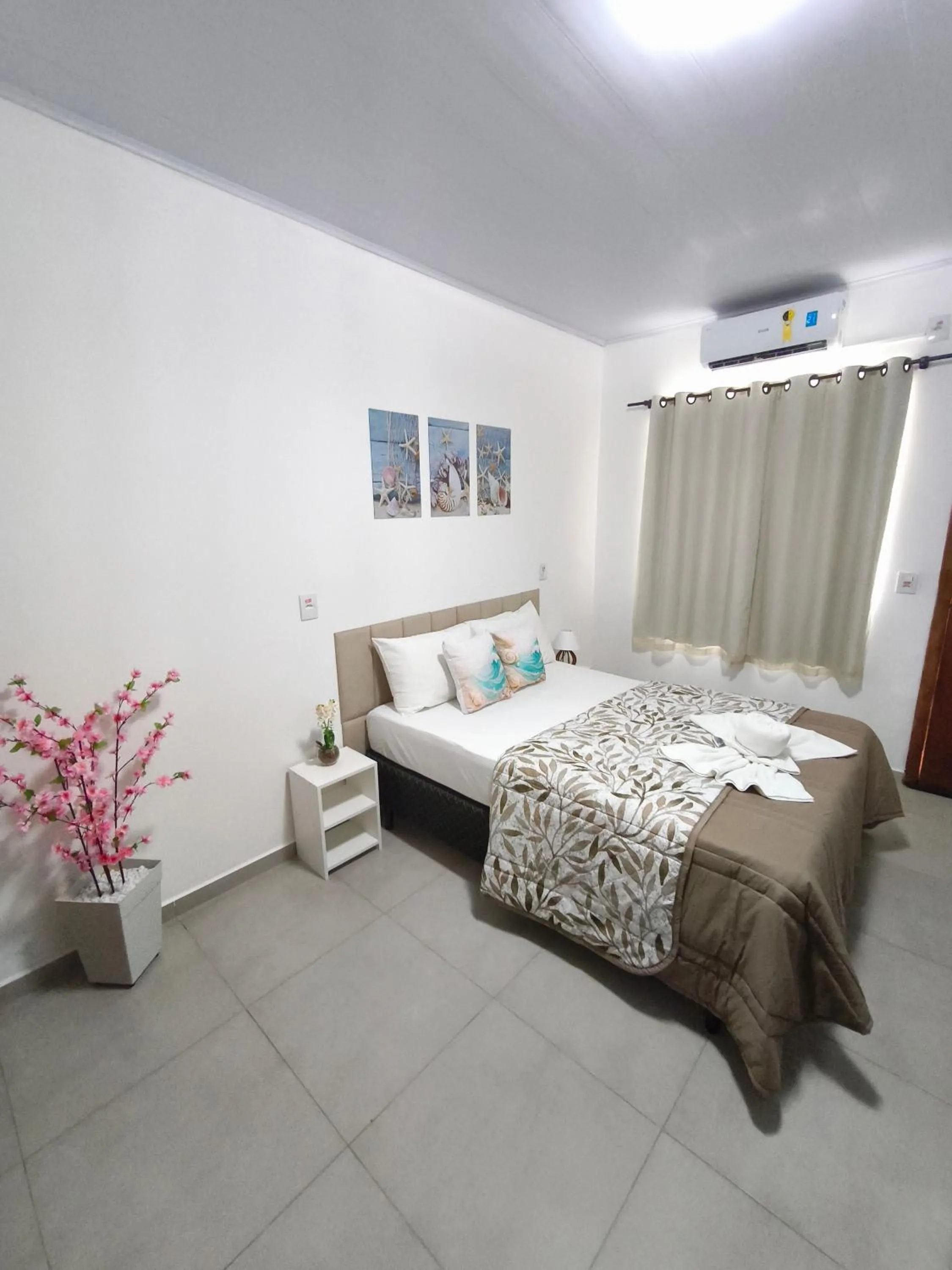 Bed in Pousada Villa Sambaqui