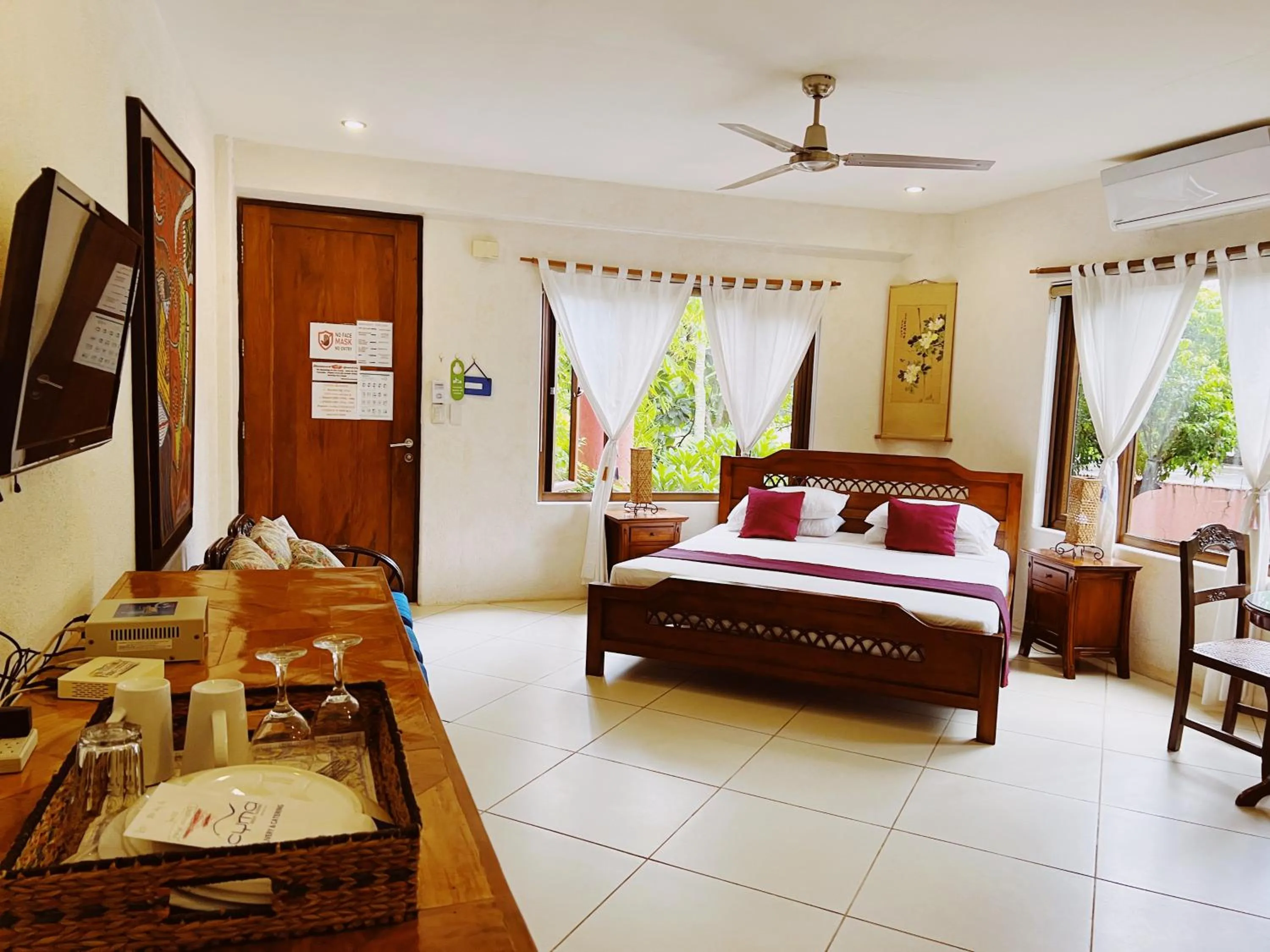 Seating area, Bed in Biancas Garden Apartments Boracay