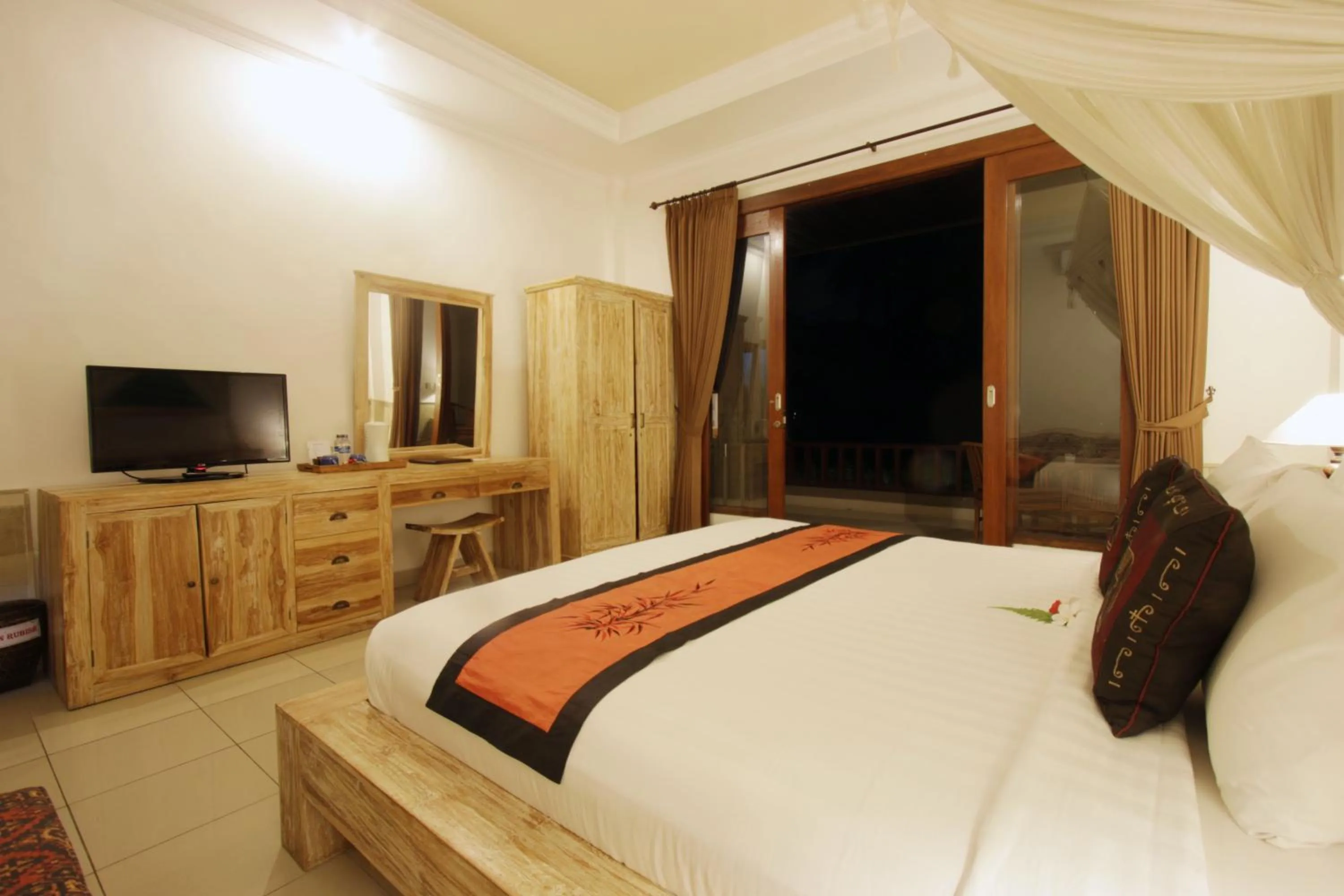 Communal lounge/ TV room, Bed in Alam Terrace Cottages